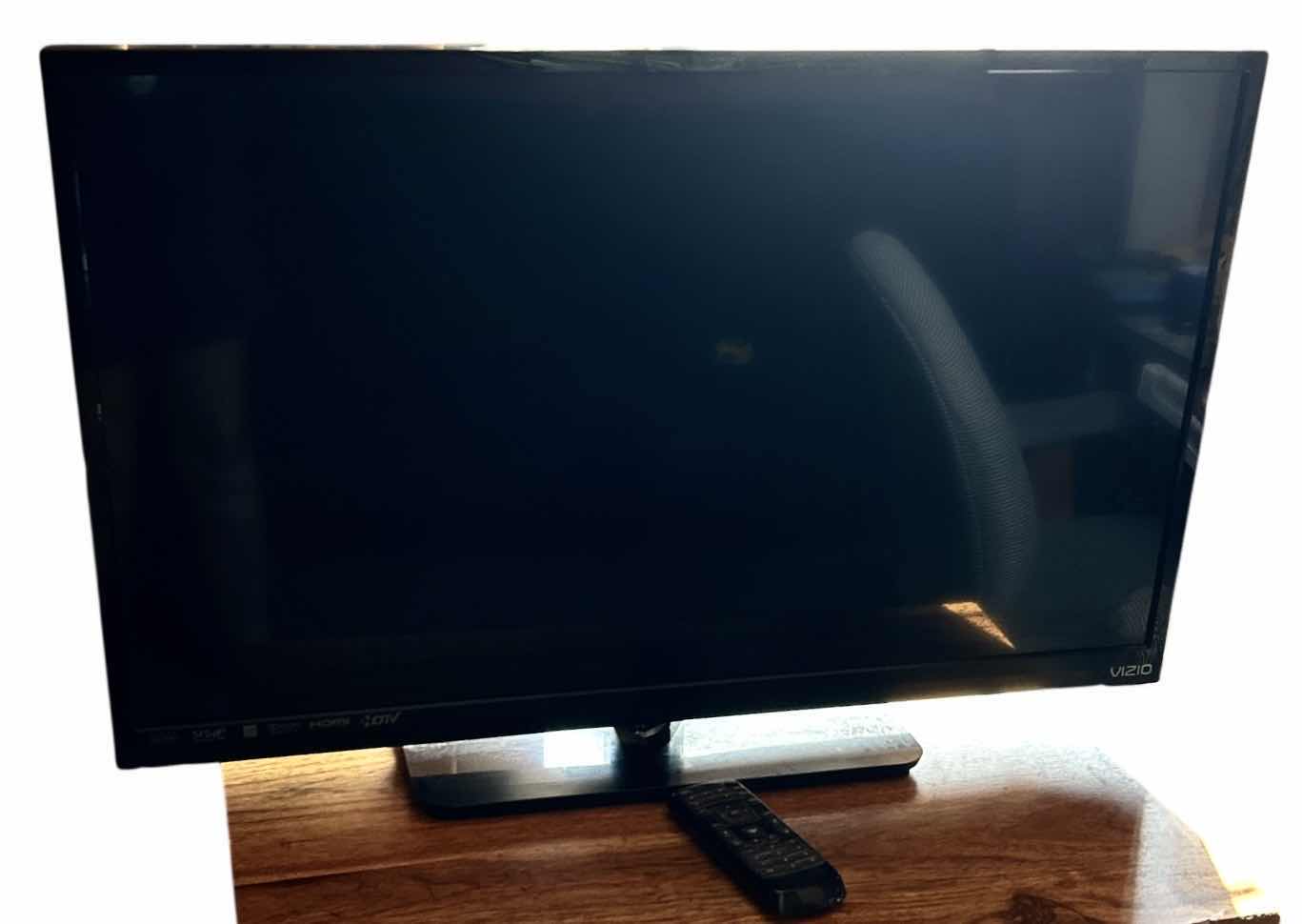 Photo 1 of 31” VIZIO TV WITH REMOTE