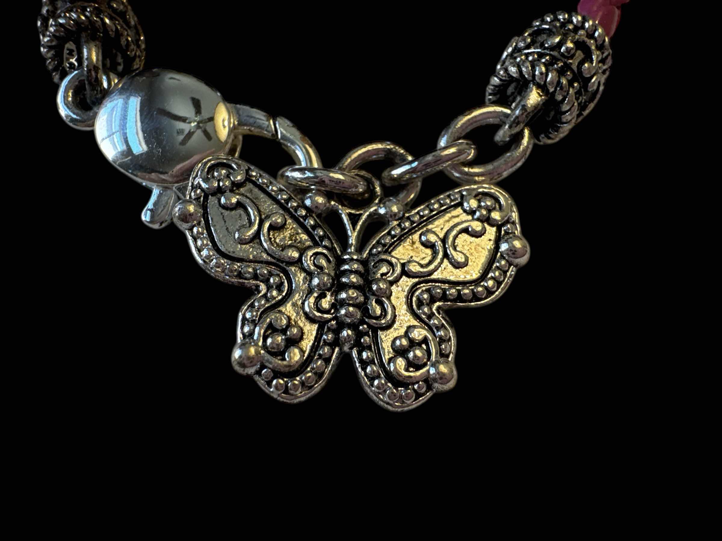 Photo 1 of BUTTERFLY CHARM BRACELET PINK AND SILVER TONE, JEWELRY 

D3”