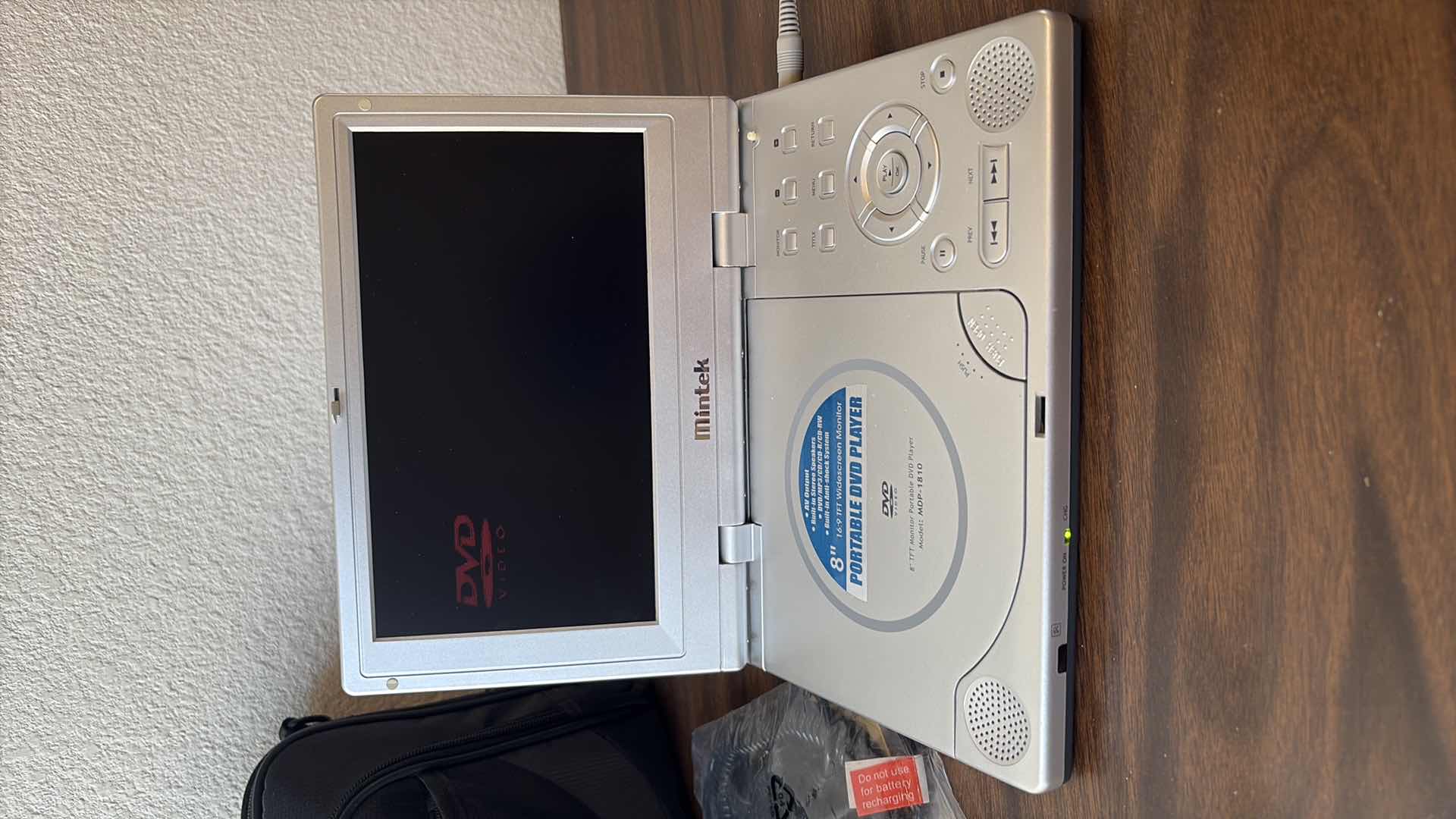 Photo 1 of 8” MINTEK PORTABLE DVD PLAYER WITH CASE REMOTE AND CAR CHARGER