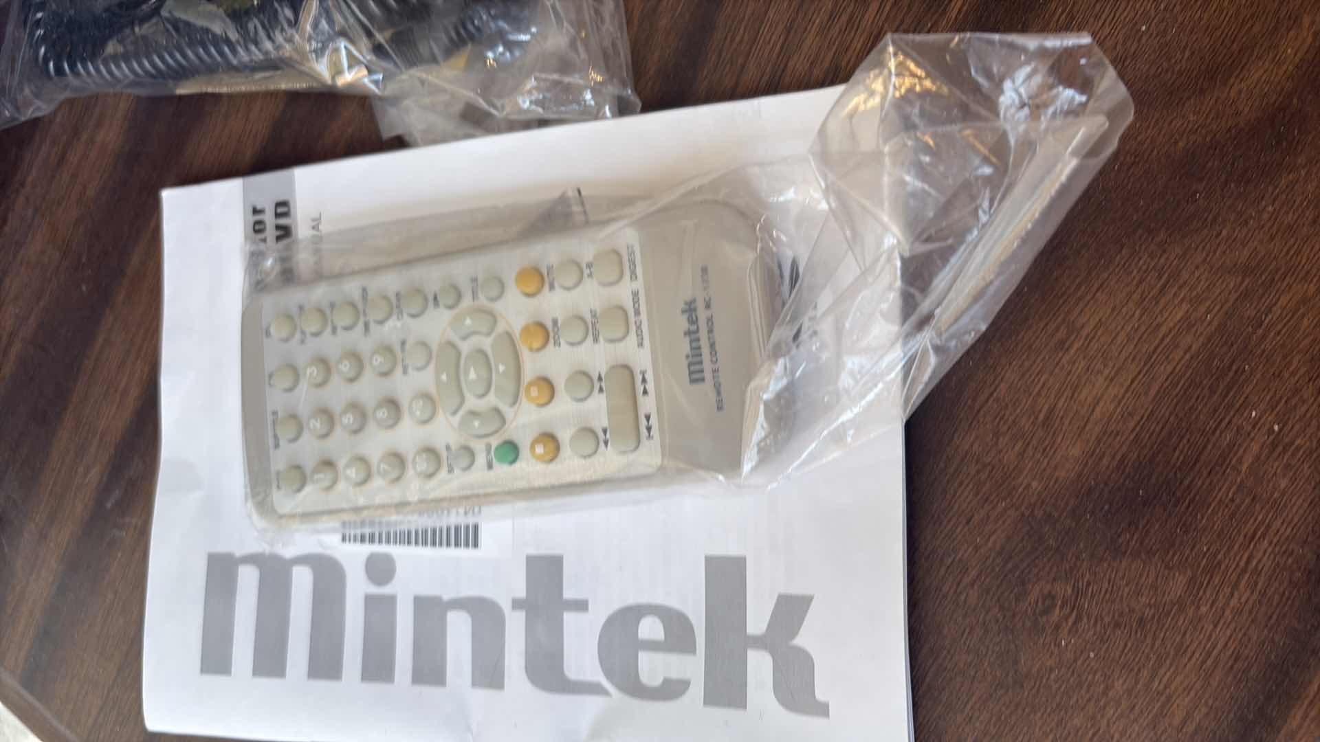 Photo 1 of 8” MINTEK PORTABLE DVD PLAYER WITH CASE REMOTE AND CAR CHARGER