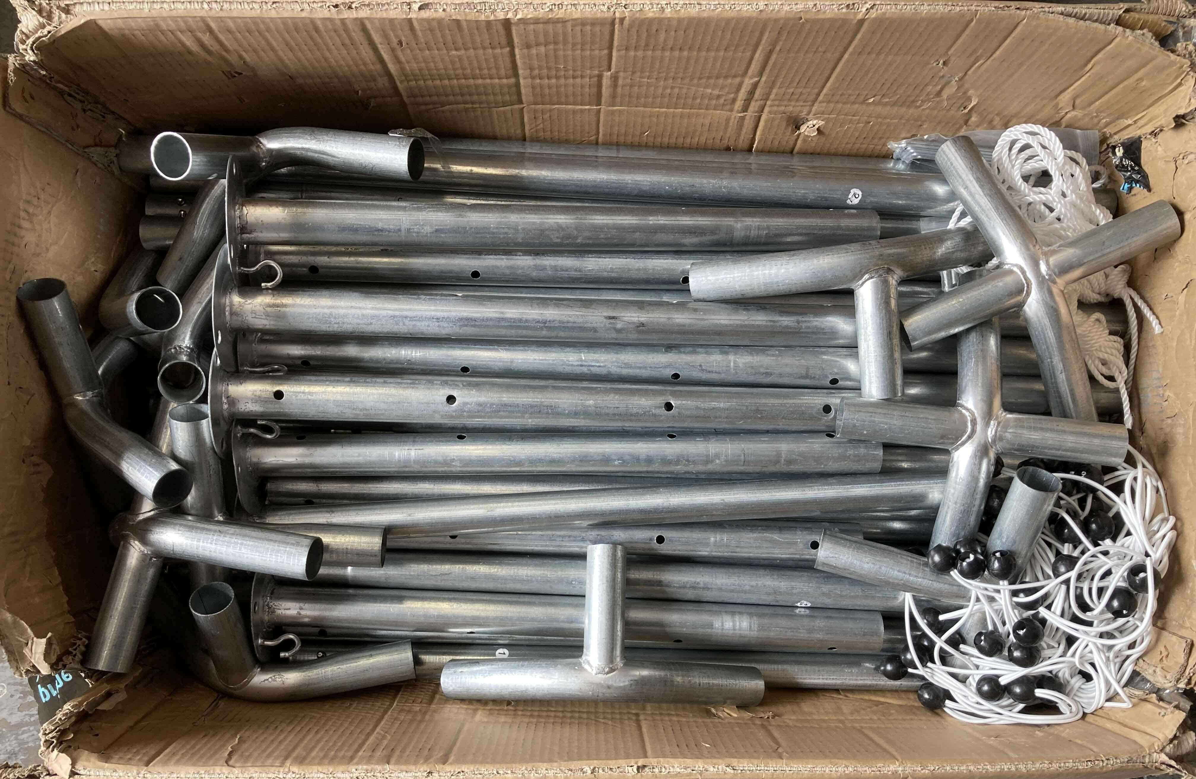 Photo 1 of LARGE GREEN TARP TENT/GOZEBO W STEEL STANDS, BRACKETS & TIE DOWNS (BOX DIMENSIONS 39.5” X 24” H13”)