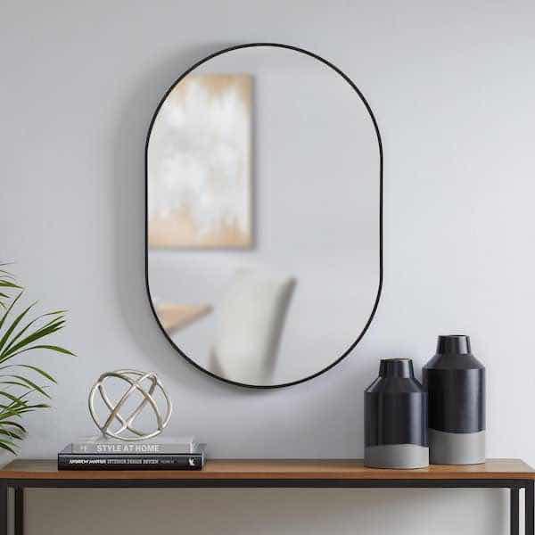 Photo 1 of STYLEWELL MEDIUM MODERN OVAL BLACK FRAMED MIRROR 22” X 32”