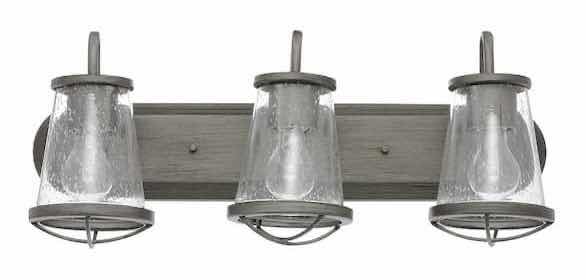 Photo 1 of HOME DECORATORS COLLECTION GEORGINA 3 LIGHT INDUSTRIAL RUSTIC VANITY FIXTURE W CLEAR SEEDED GLASS SHADES MODEL HB2626-322 24” X 9.75”