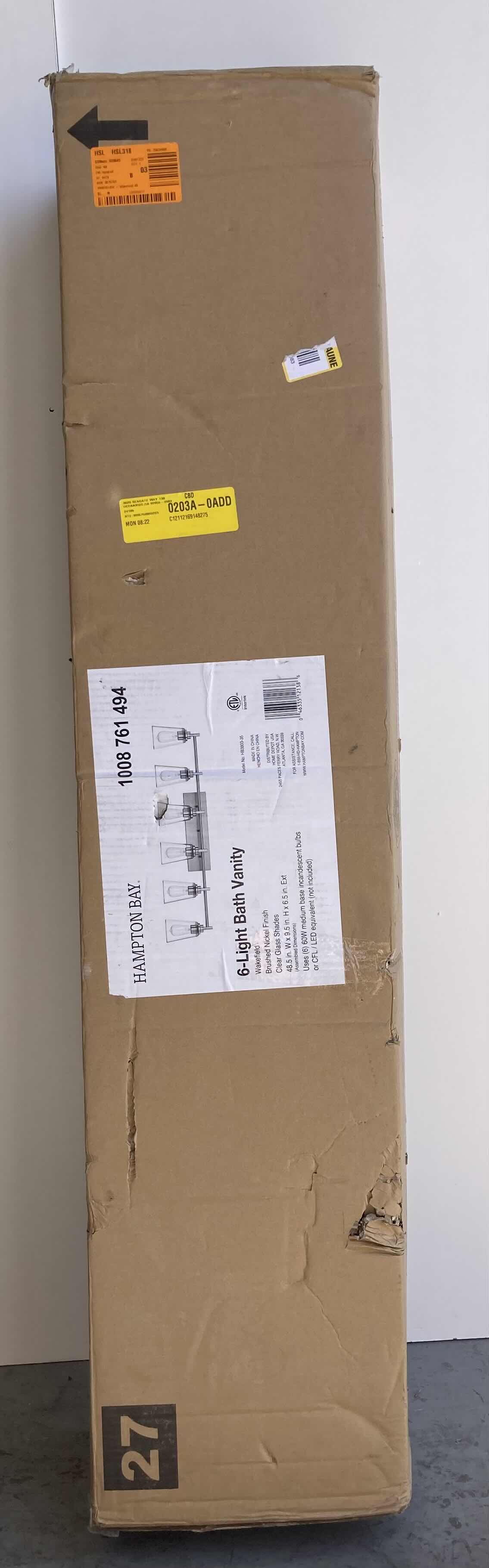 Photo 5 of HAMPTON BAY WAKEFIELD BRUSHED NICKLE 6 LIGHT CLEAR GLASS SHADE VANITY FIXTURE LIGHT 1008761494 48.5” X 6.5” H9.5”