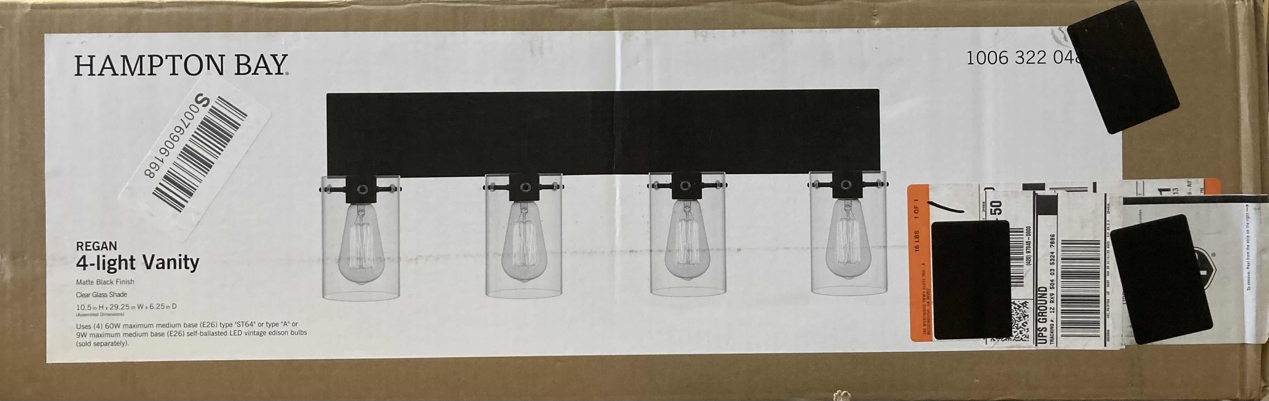 Photo 5 of HAMPTON BAY 29.24” REGAN MATTE BLACK 4 LIGHT BATHROOM VANITY LIGHT W CLEAR GLASS SHADES MODEL DSHD19574V3 29.1” X 6.2” H10.3”