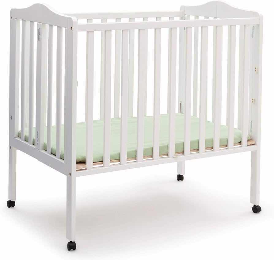 Photo 1 of DELTA CHILDREN WHITE FINISH PORTABLE CRIB W MATTRESS MODEL 4470-100