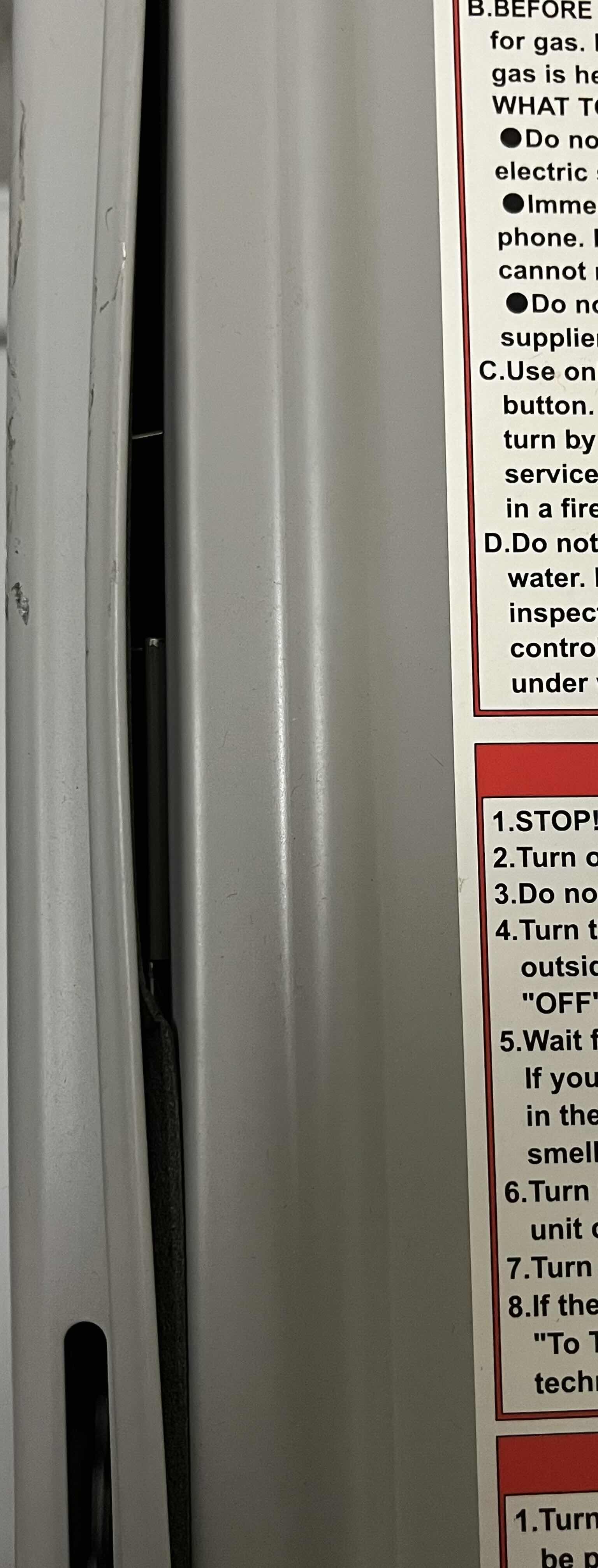 Photo 1 of RHEEM PERFORMANCE PLUS SMART TANKLESS WATER HEATER MODEL ECO200XLN3-1