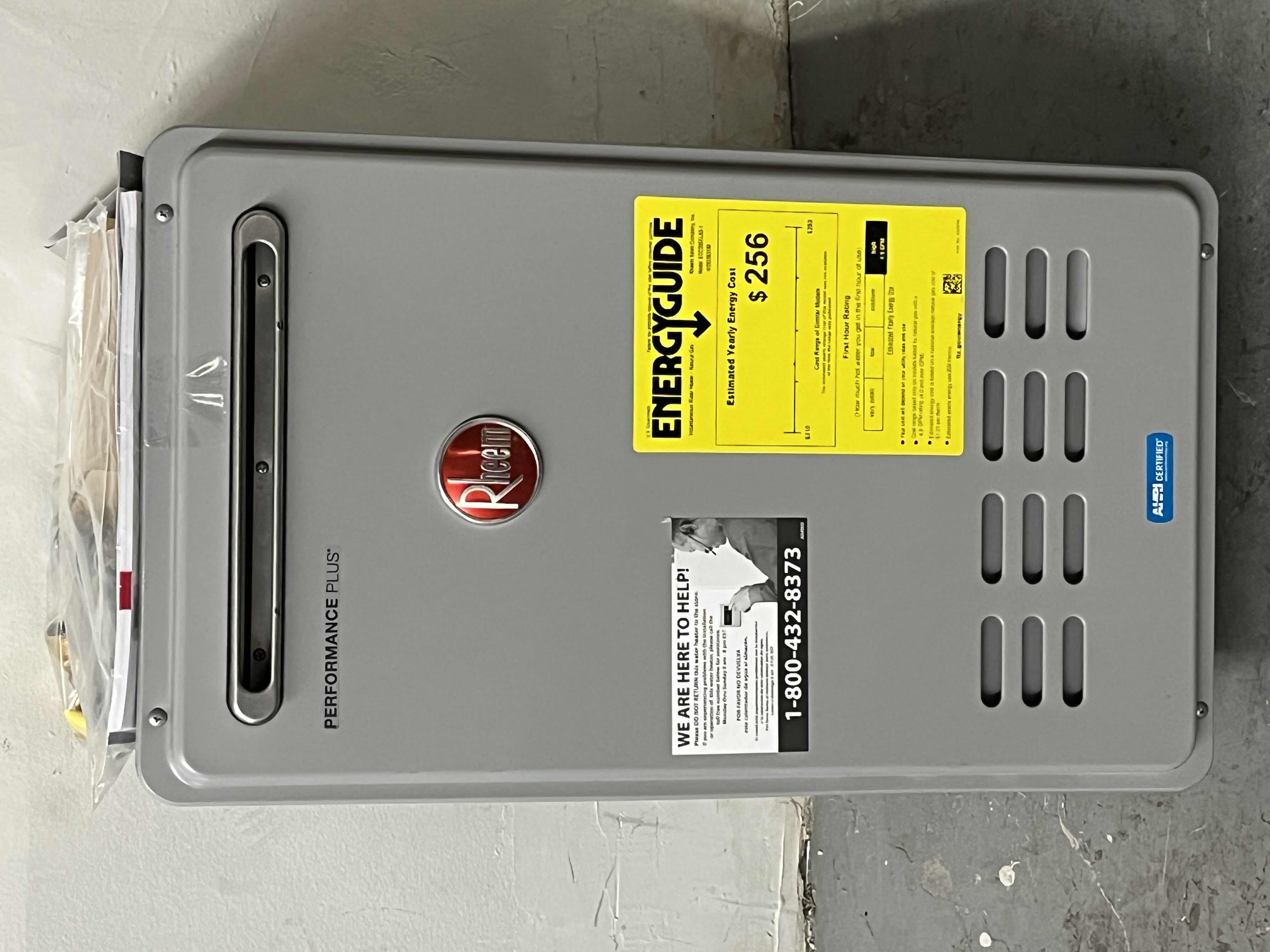 Photo 1 of RHEEM PERFORMANCE PLUS TANKLESS WATER HEATER MODEL ECO200XLN3-1