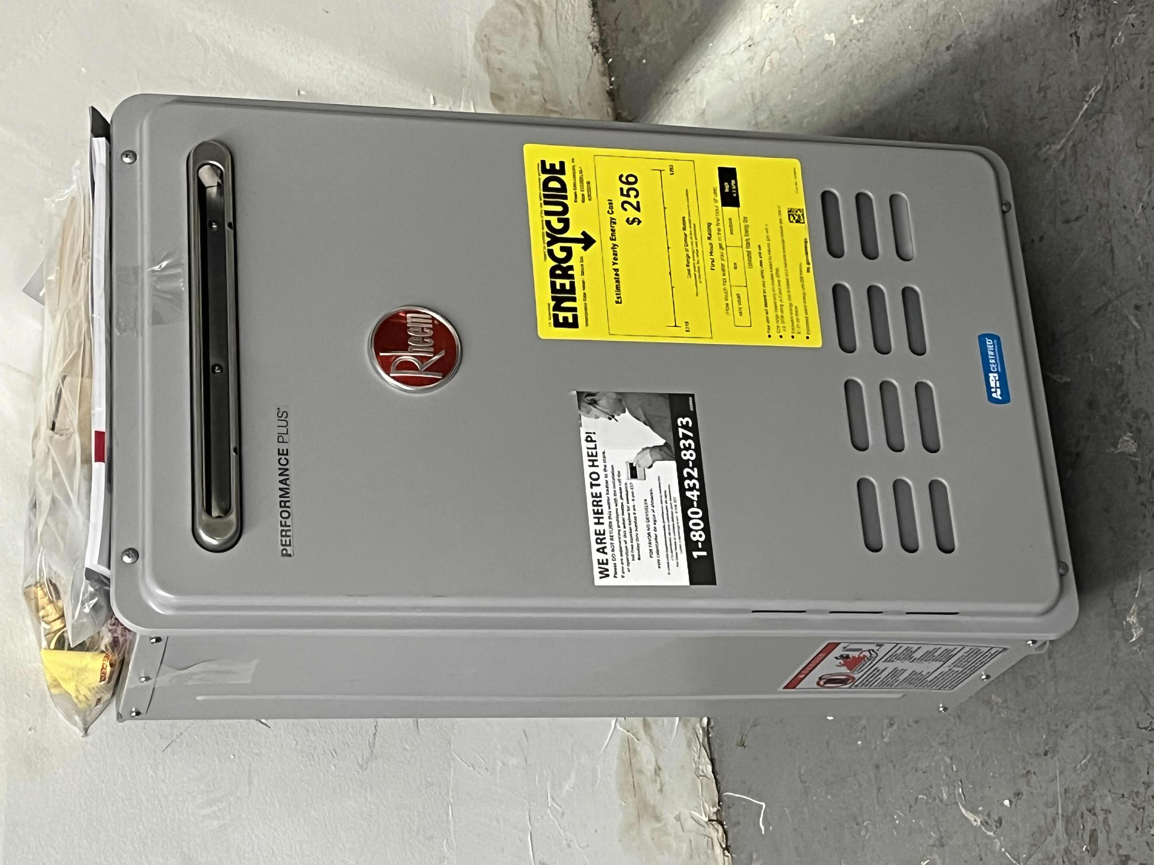 Photo 1 of RHEEM PERFORMANCE PLUS TANKLESS WATER HEATER MODEL ECO200XLN3-1