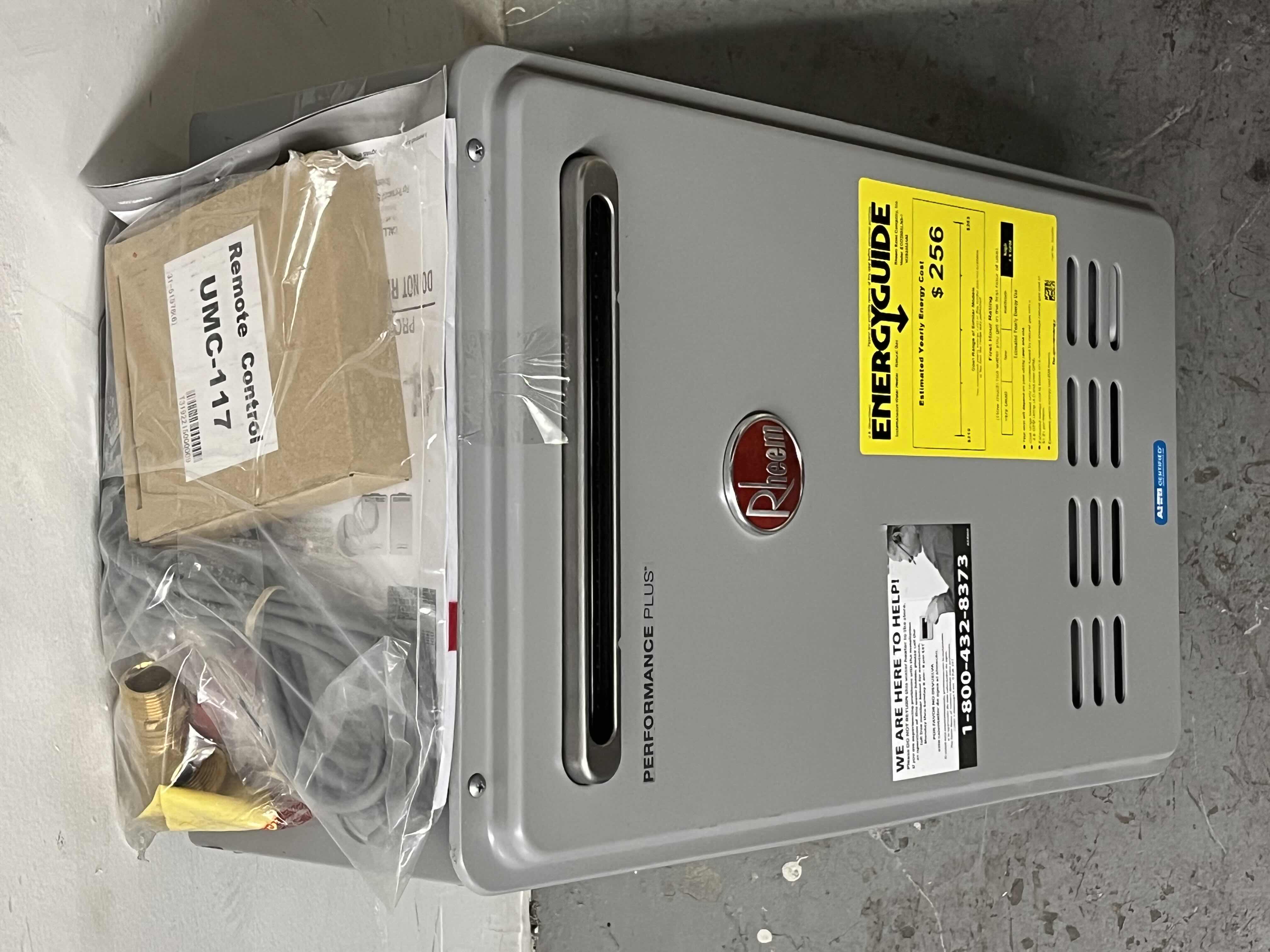 Photo 1 of RHEEM PERFORMANCE PLUS TANKLESS WATER HEATER MODEL ECO200XLN3-1