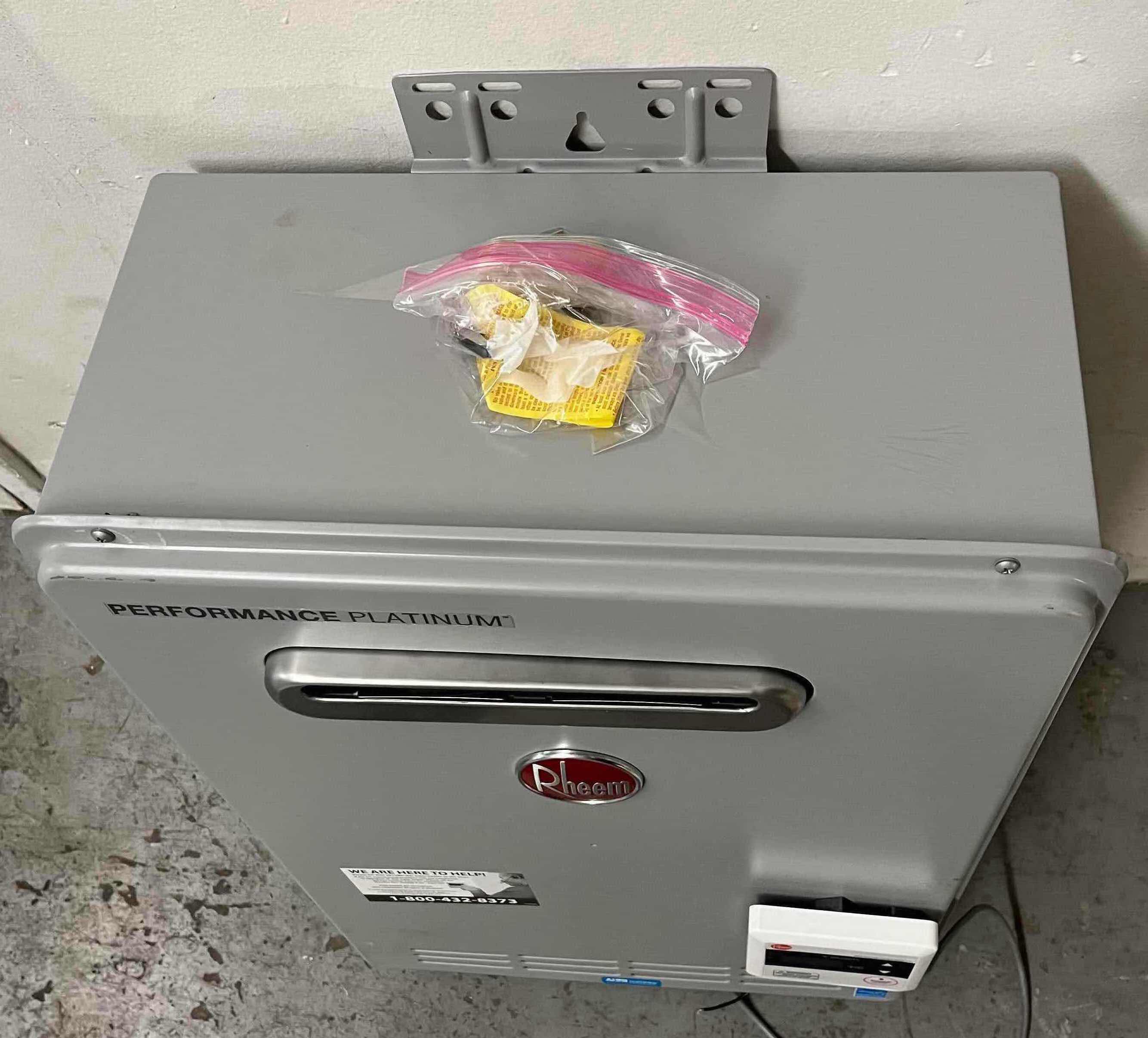 Photo 1 of RHEEM PERFORMANCE PLATINUM TANKLESS WATER HEATER MODEL ECOH200XLN-2