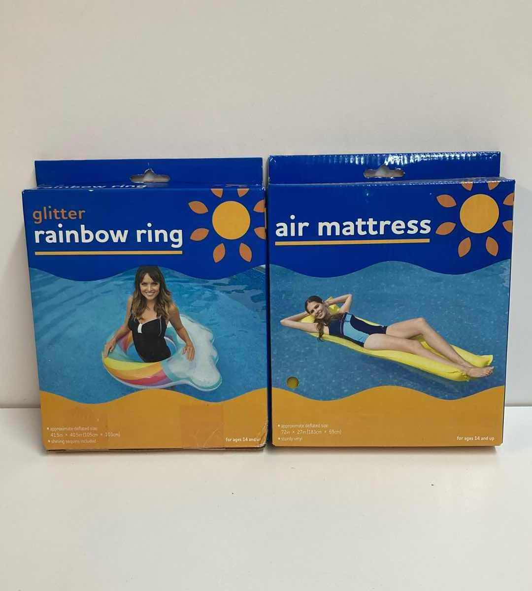 Photo 1 of RITE AID GLITTER RAINBOW RING & AIR MATTRESS POOL FLOATS