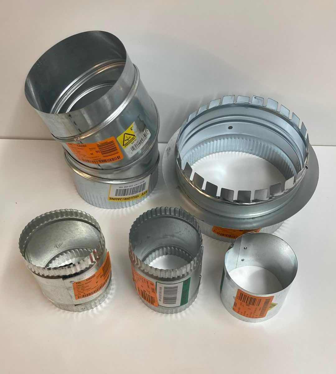 Photo 1 of MASTER FLOW GALVANIZED STEEL DUCT PIPE-ROUND ADJUSTABLE ELBOW 6” 90 DEG, STARTING COLLAR 8”, EAVE VENT 4”, & 2 FLEXIBLE SHEET METAL CONNECTOR SPLICE COLLAR 4”