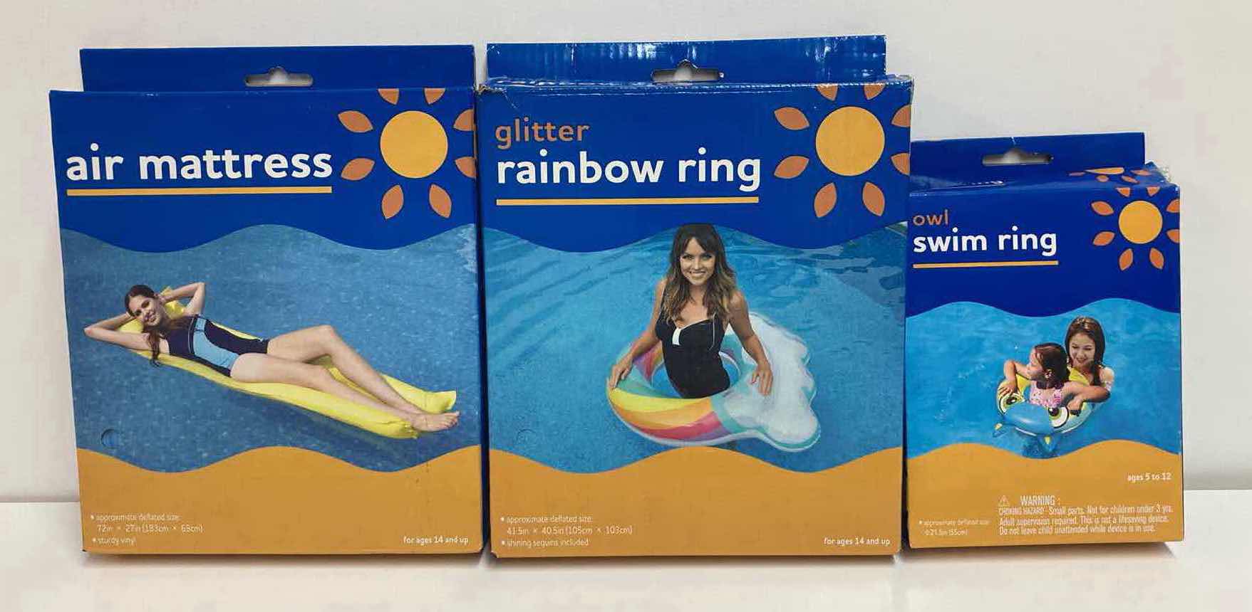 Photo 1 of RITE AID AIR MATTRESS, GLITTER RAINBOW RING & OWL SWIM RING FLOAT