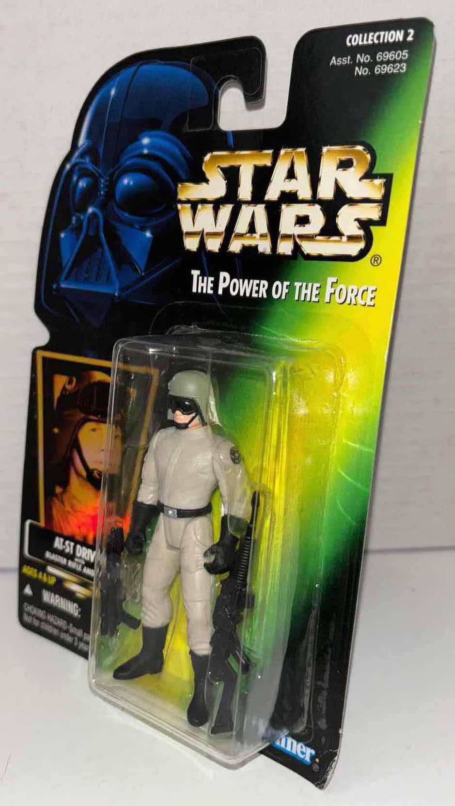 Photo 1 of NEW KENNER STAR WARS THE POWER OF THE FORCE ACTION FIGURE, AT-ST DRIVER W BLASTER RIFLE & PISTOL