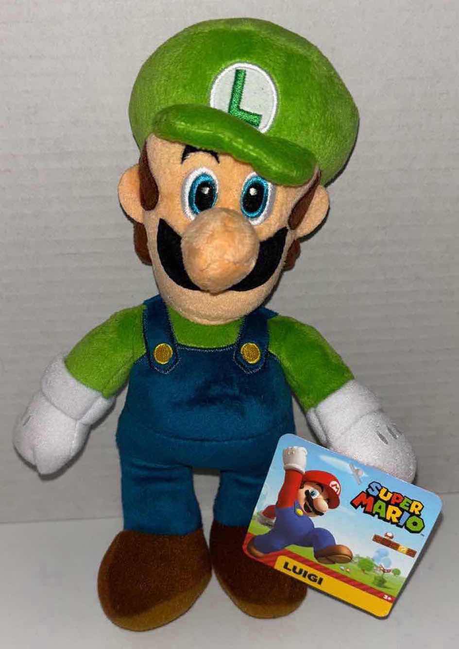 Photo 1 of NEW JAKKS PACIFIC SUPER MARIO 9” PLUSH, “LUIGI”