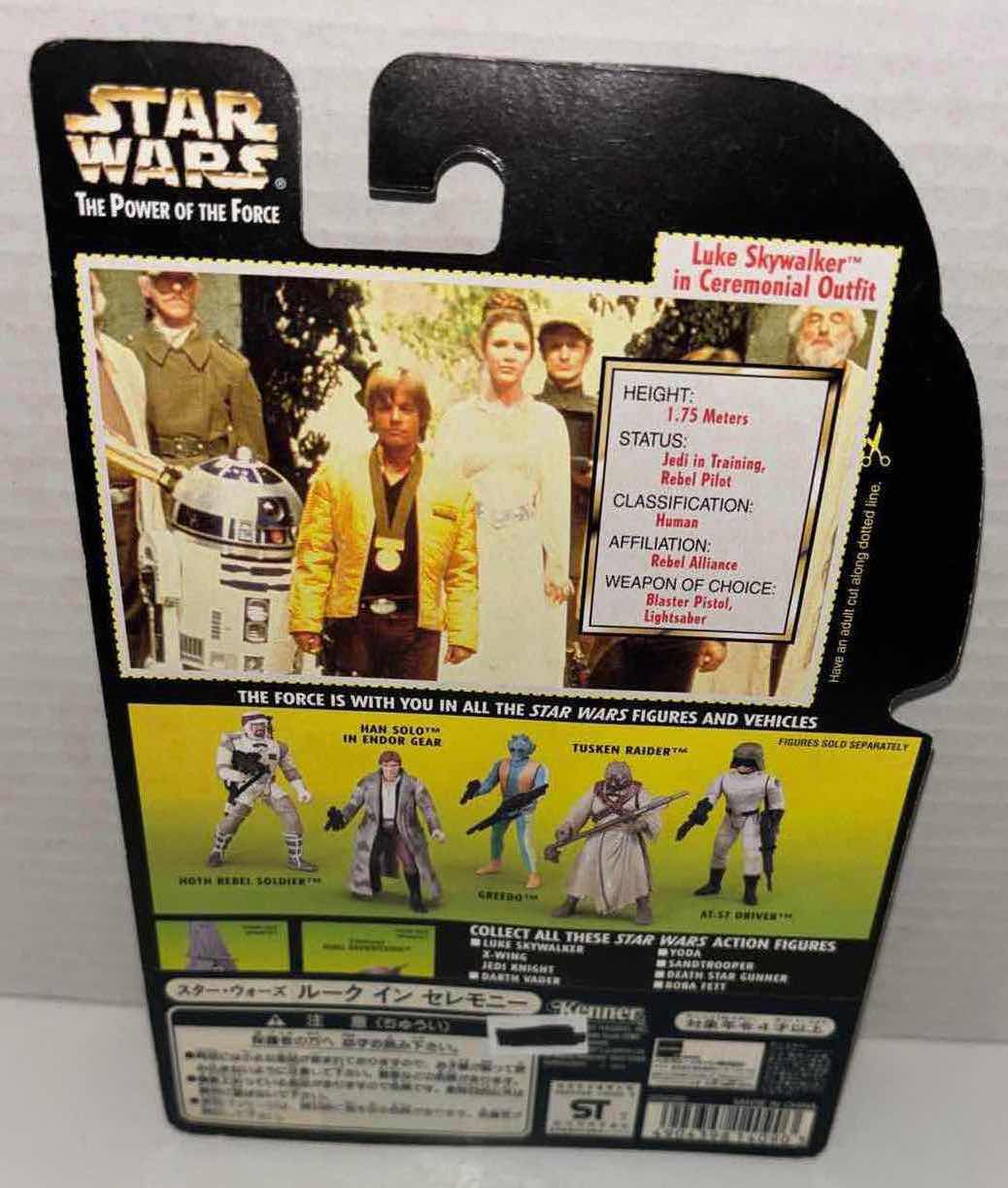 Photo 1 of NEW KENNER STAR WARS THE POWER OF THE FORCE ACTION FIGURE, LUKE SKYWALKER IN CEREMONIAL OUTFIT W MEDAL OF VALOR & BLASTER PISTOL