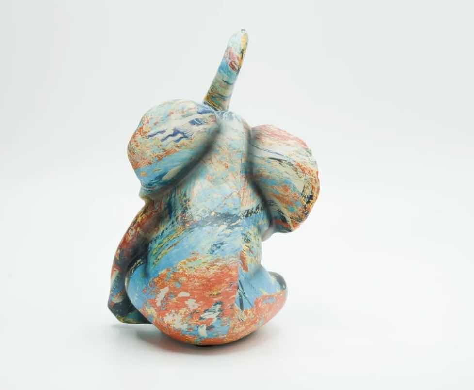 Photo 1 of BRANI COLORFUL RESIN ELEPHANT 5” x 6” x 8”