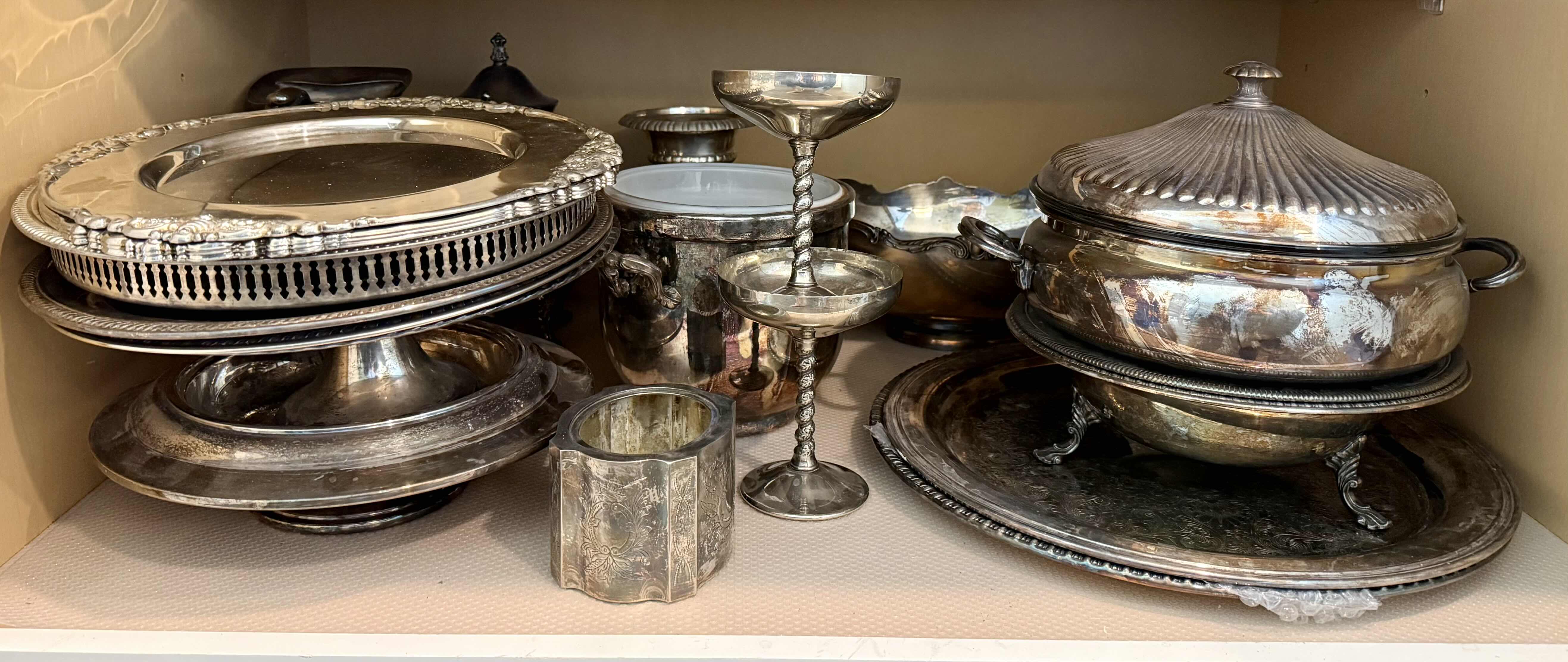 Photo 1 of CONTENTS OF KITCHEN CABINET-SILVER-PLATED SERVE-WARE