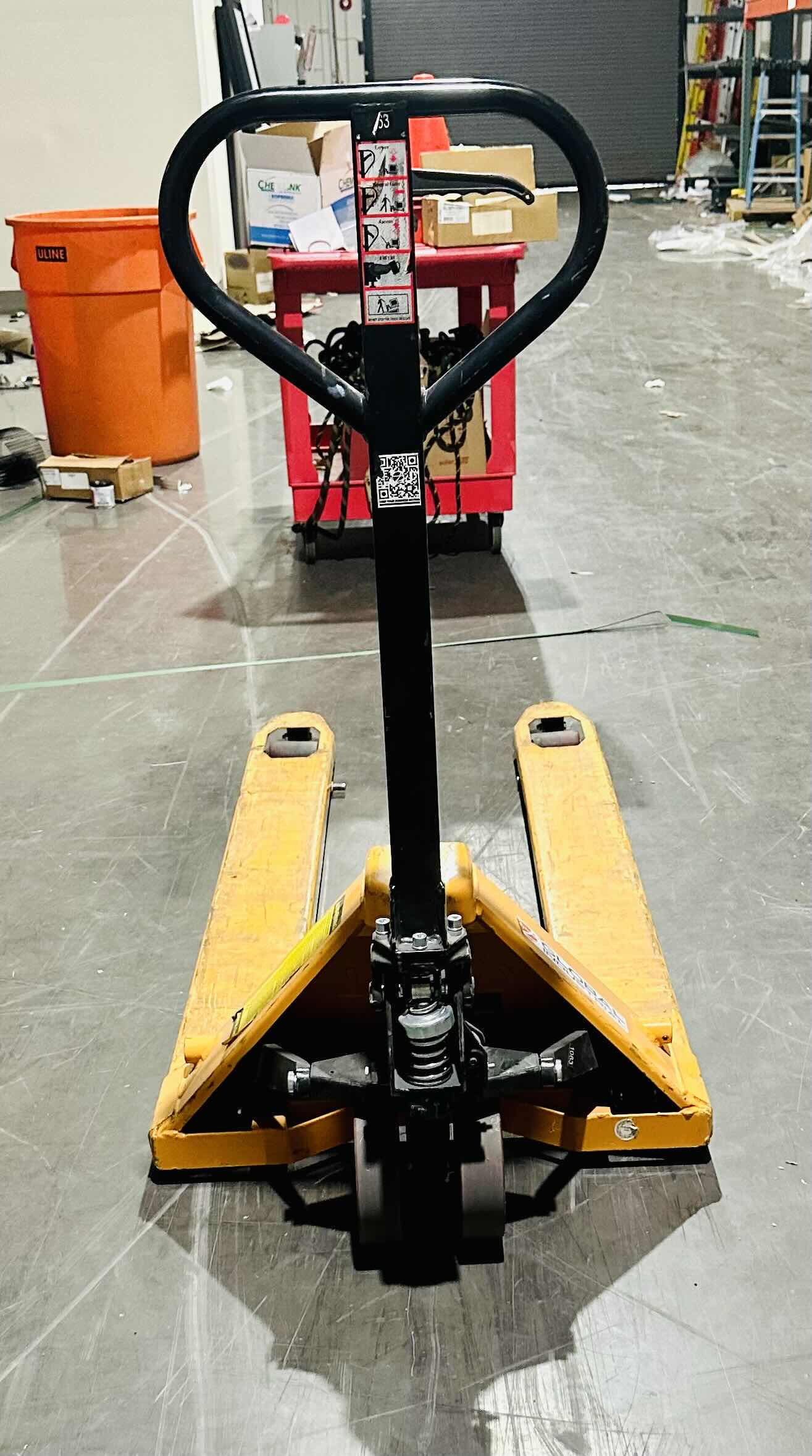 Photo 1 of GLOBAL INDUSTRAL PALLET JACK TRUCK