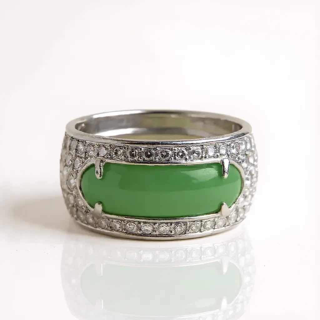 Photo 1 of 18K WHITE GOLD W 9.00 JADE & 0.25 DIAMOND RING W INSURANCE APPRAISAL (APPROX SIZE 6/7) TTL GRAMS 7.55 ITEM #2012 