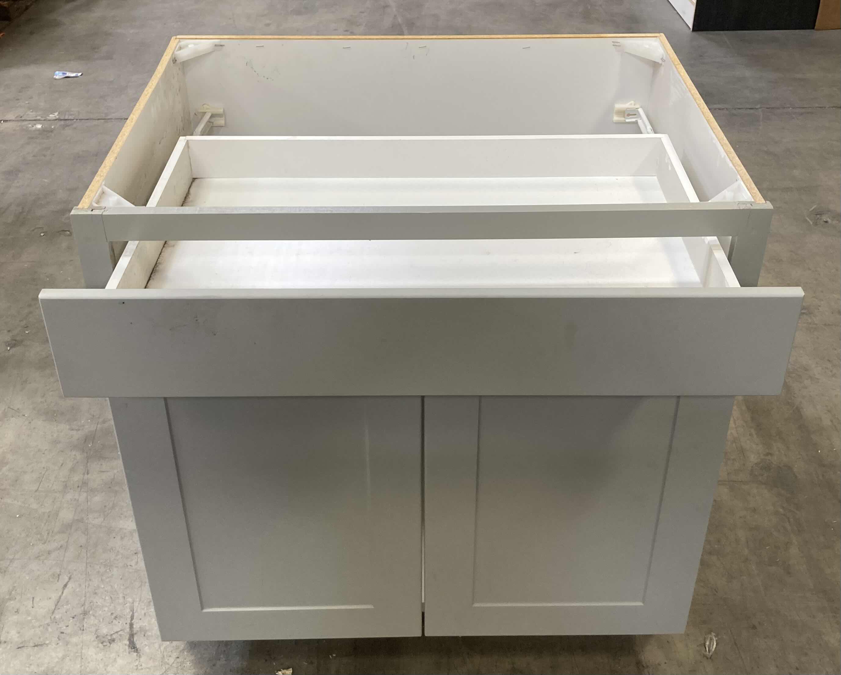 Photo 1 of LEEDO SAVOY WHITE PEBBLE FINISH 2 DOOR 1 DRAWER & 1 SHELF BASE CABINET 33” X 24” H34.5”