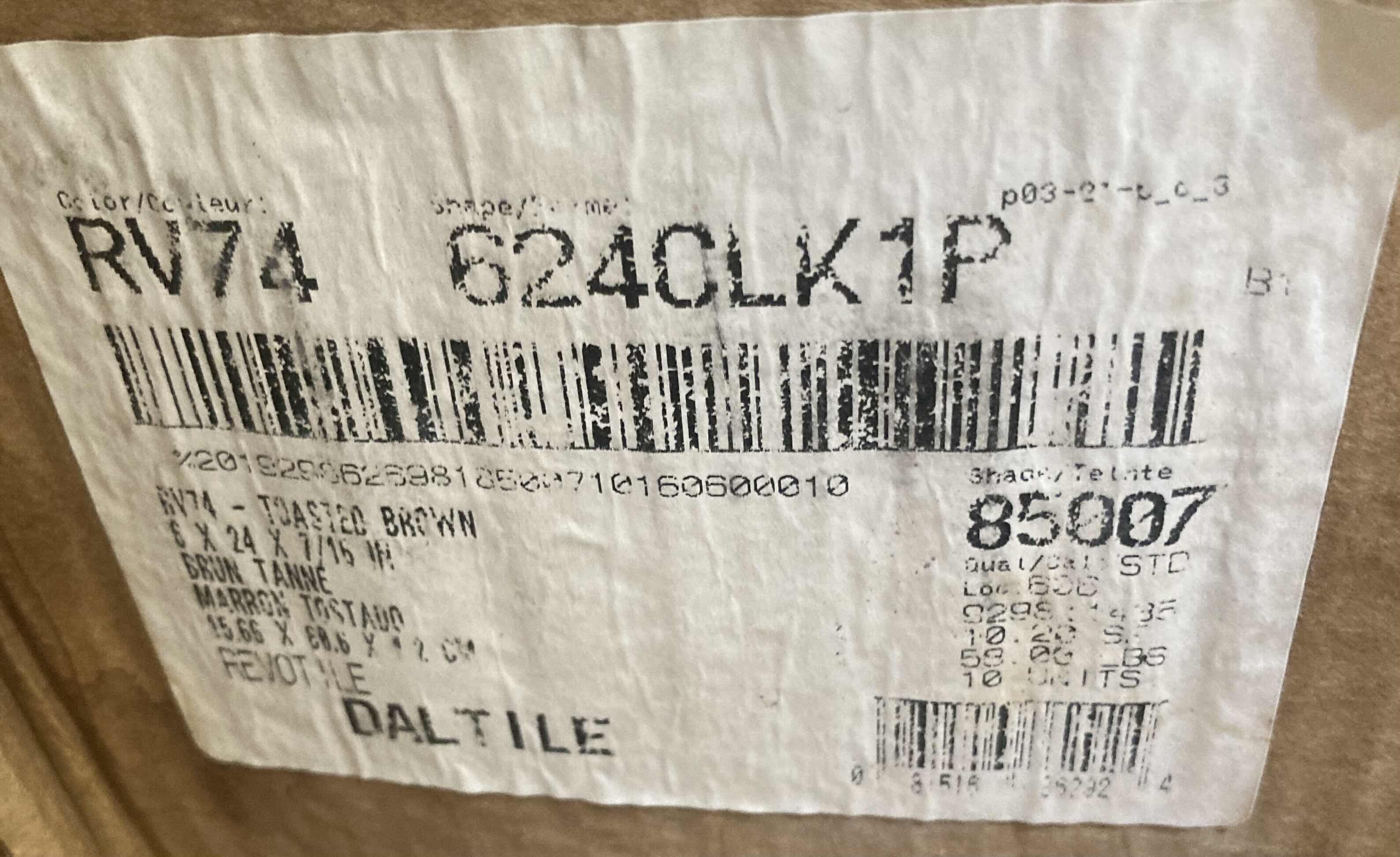 Photo 1 of DALTILE REVOTILE TOASTED BROWN WOOD FINISH SNAP IN CLICK PORCELAIN TILE 6” X 24” (10.20SQFT PER CASE/26CASES APPROX 265.2SQFT TOTAL) READ NOTES