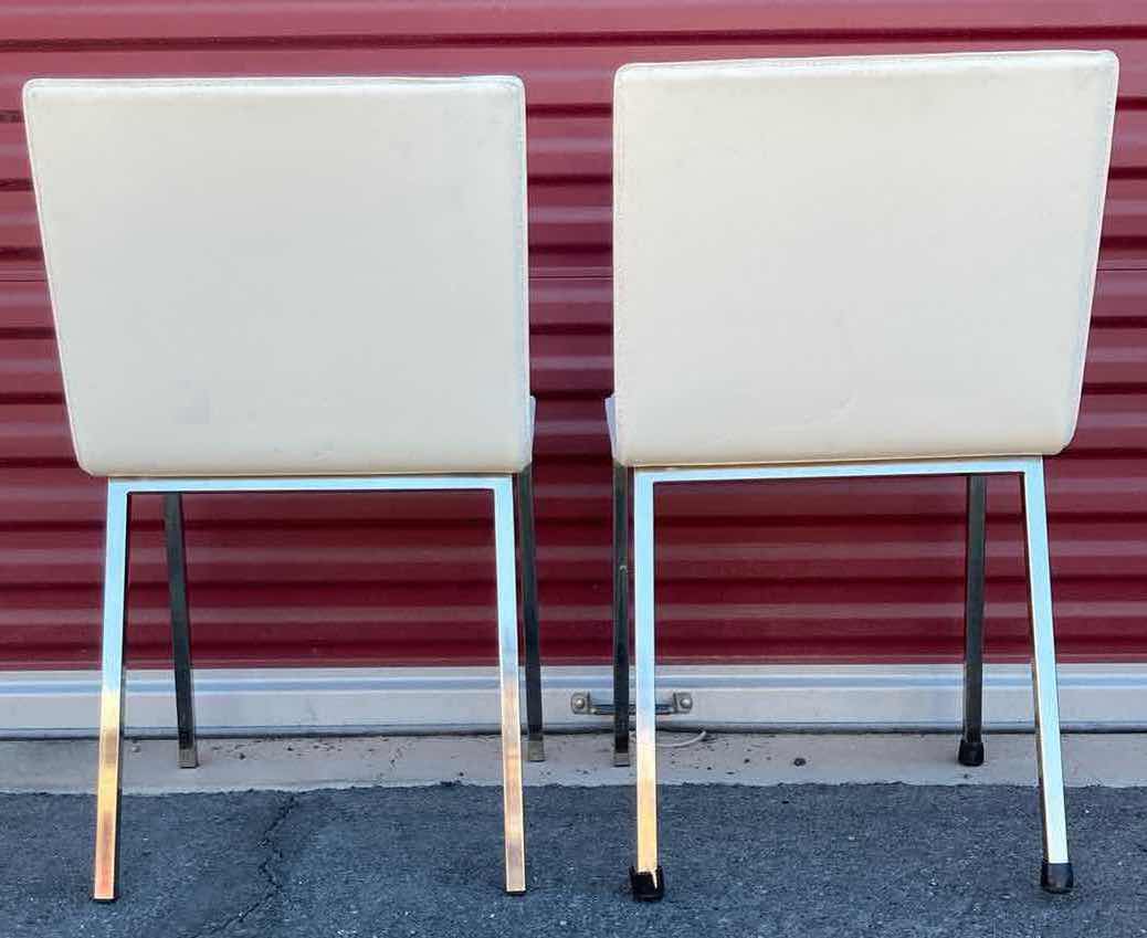 Photo 1 of CB2 PHOENIX IVORY LEATHER DONING CHAIRS 18” X 23” H32” (2)