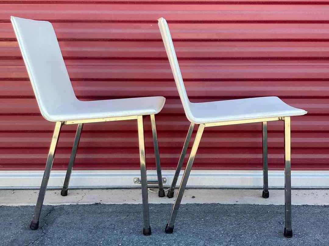 Photo 1 of CB2 PHOENIX IVORY LEATHER DINING CHAIRS 18” X 23” H32” (2)