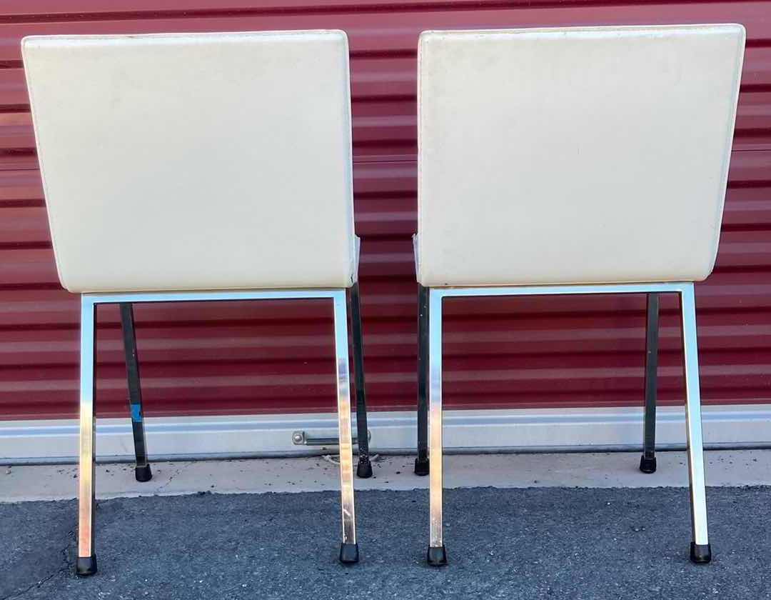 Photo 1 of CB2 PHOENIX IVORY LEATHER DINING CHAIRS 18” X 23” H32” (2)