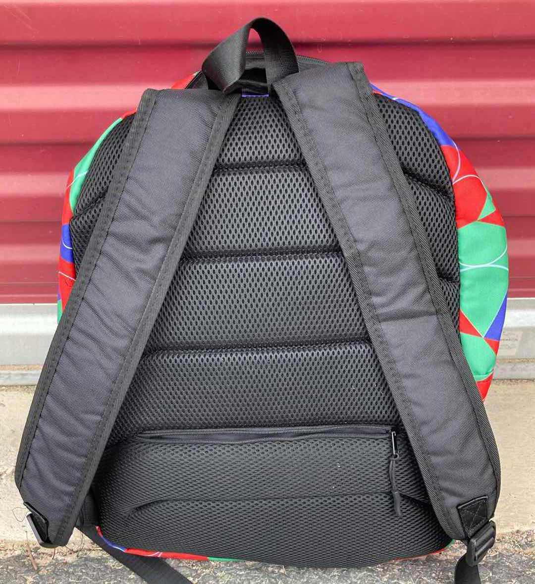 Photo 1 of BLUE, RED & GREEN BACKPACK