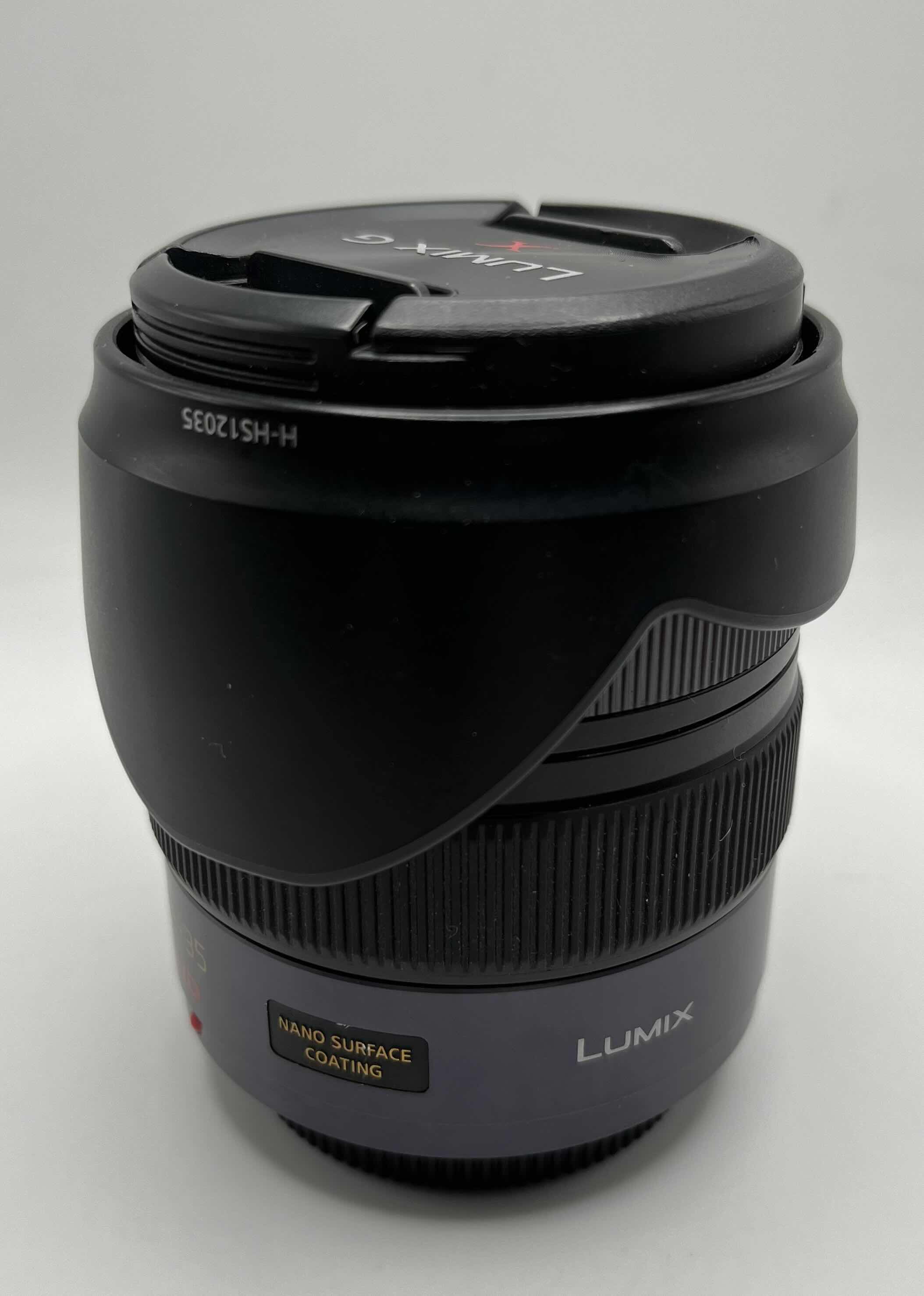 Photo 1 of PANASONIC LUMIX G SERIES VARIO 1:2.8 12/35 ASPH 0.25MM/0.82FT POWER O.I.S LENS H-HS12035 W SOFT CASE