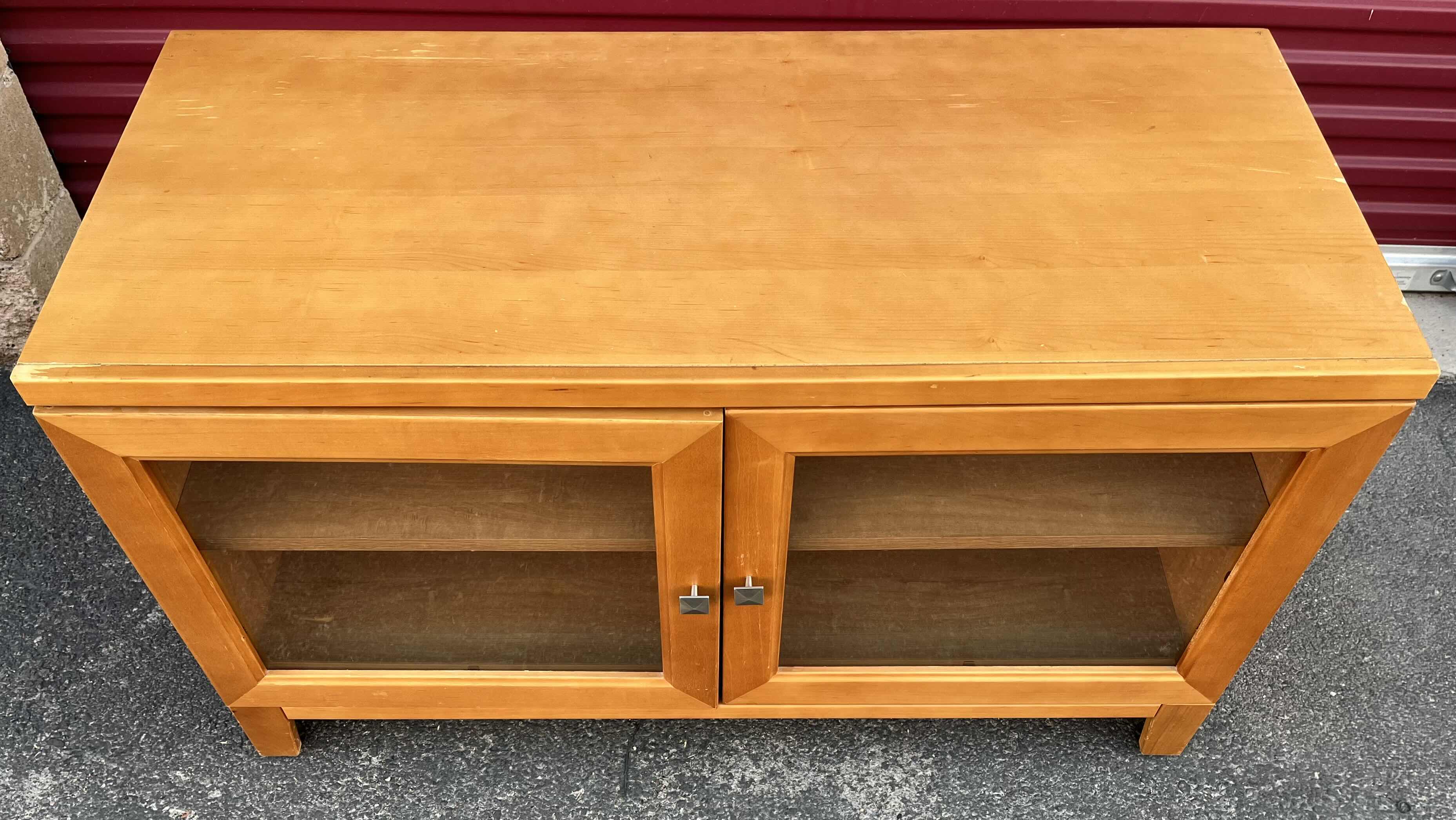 Photo 1 of EASTWOOD FURNITURE WOOD FINISH TV CONSOLE STAND 46” X 21” H26.5”