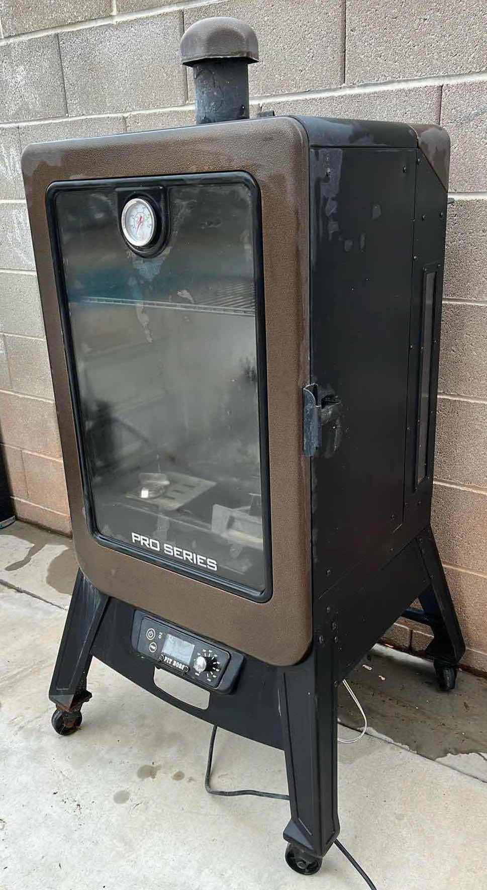 Photo 1 of PIT BOSS PRO SERIES VERTICAL BBQ SMOKER MODEL PBV4PS1