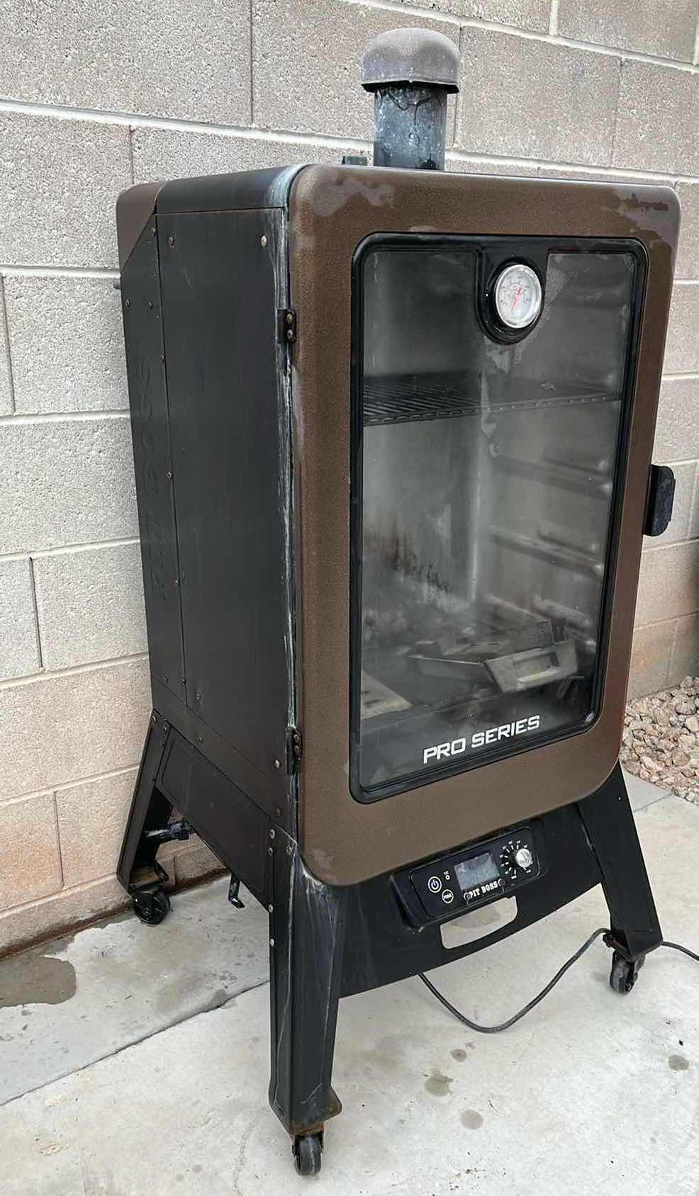 Photo 1 of PIT BOSS PRO SERIES VERTICAL BBQ SMOKER MODEL PBV4PS1