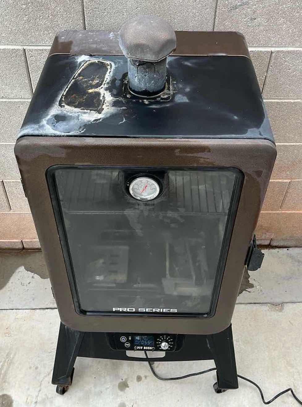 Photo 1 of PIT BOSS PRO SERIES VERTICAL BBQ SMOKER MODEL PBV4PS1