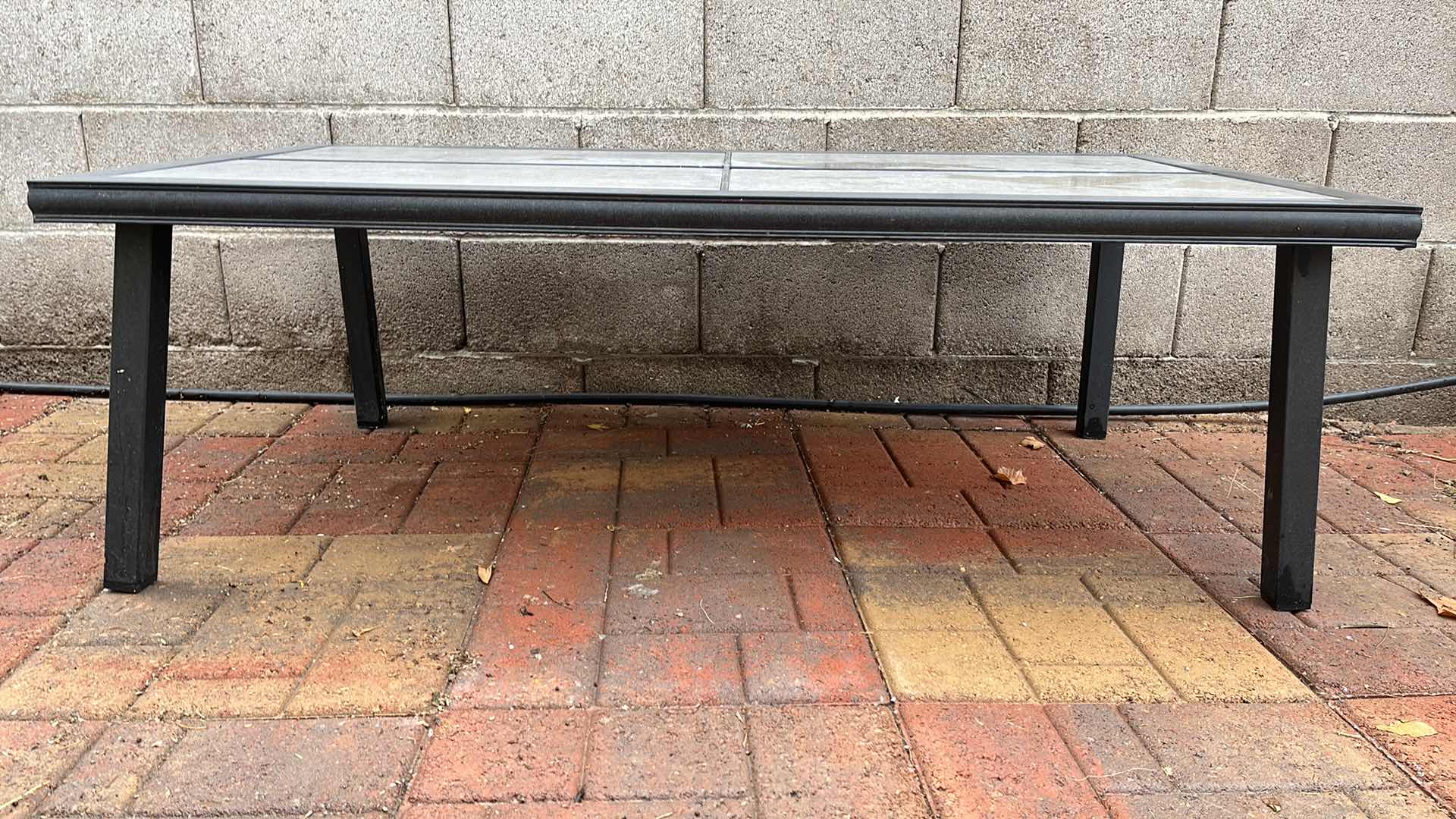 Photo 1 of STONE TILE TOP MATTE BLACK METAL FRAME PATIO COFFEE TABLE 51” X 28” H17”