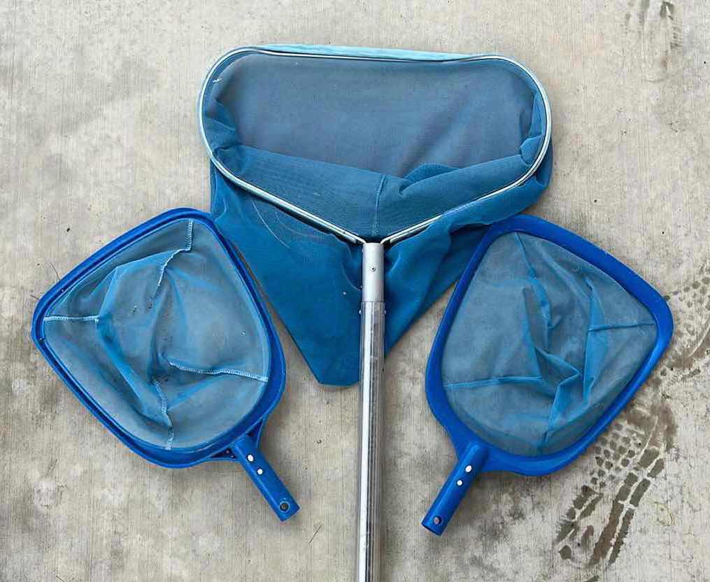 Photo 1 of POOL CLEANING ALUMINUM POLE W CLEANING ATTACHMENTS (5)