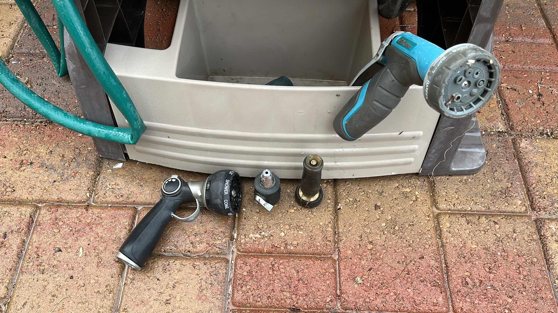 Photo 1 of AMES GARDEN HOSE REEL W HOSE NOZZLE ATTACHMENTS (4)