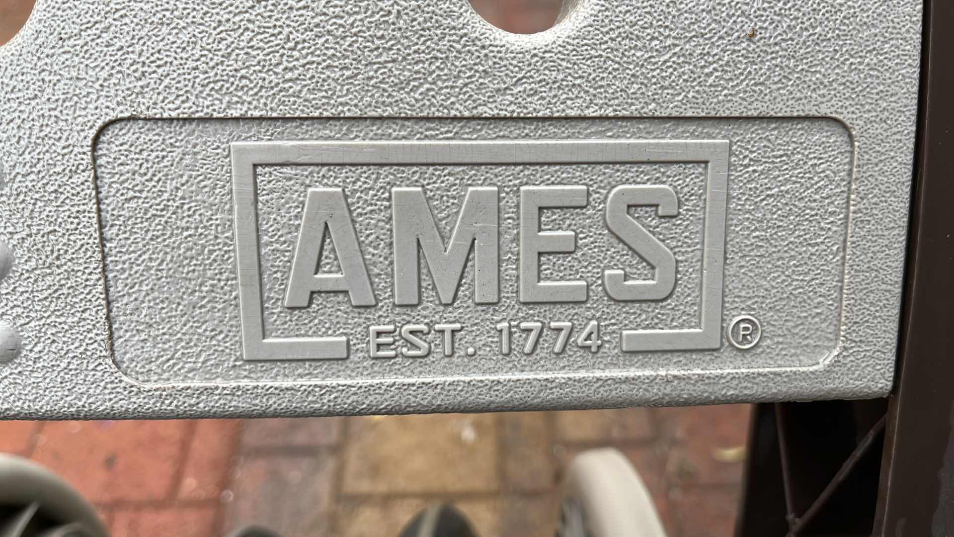 Photo 1 of AMES GARDEN HOSE REEL W HOSE NOZZLE ATTACHMENTS (4)