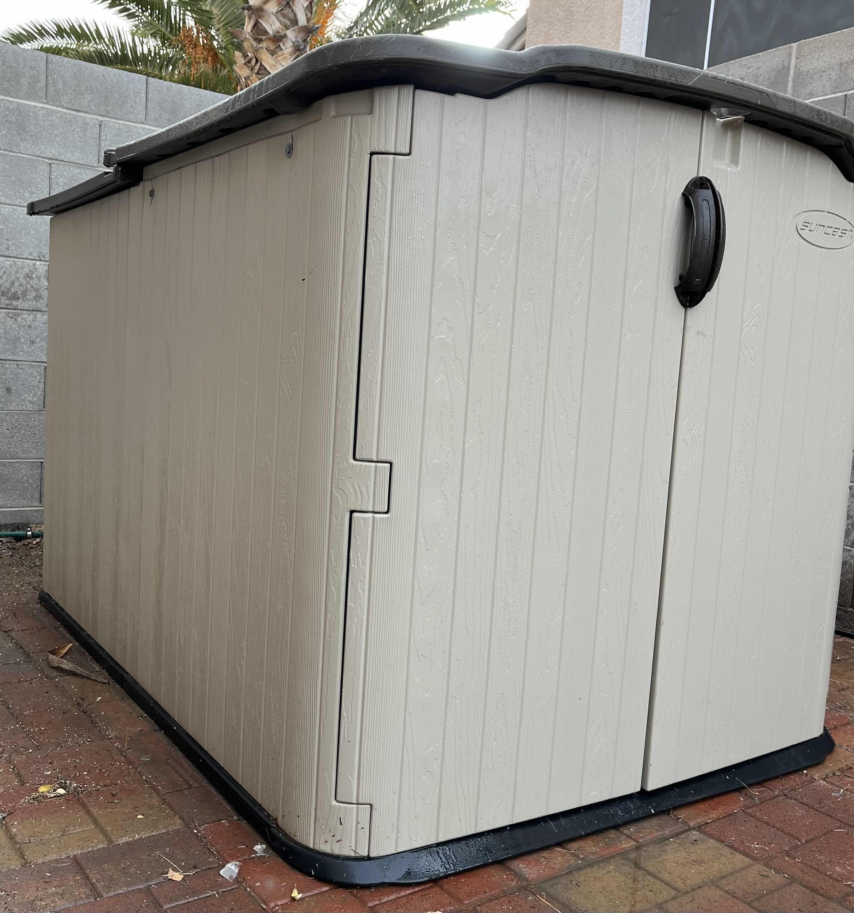 Photo 1 of SUNCAST OUTDOOR POLYURETHANE STORAGE SHED 57.5” X 81” H52.25”