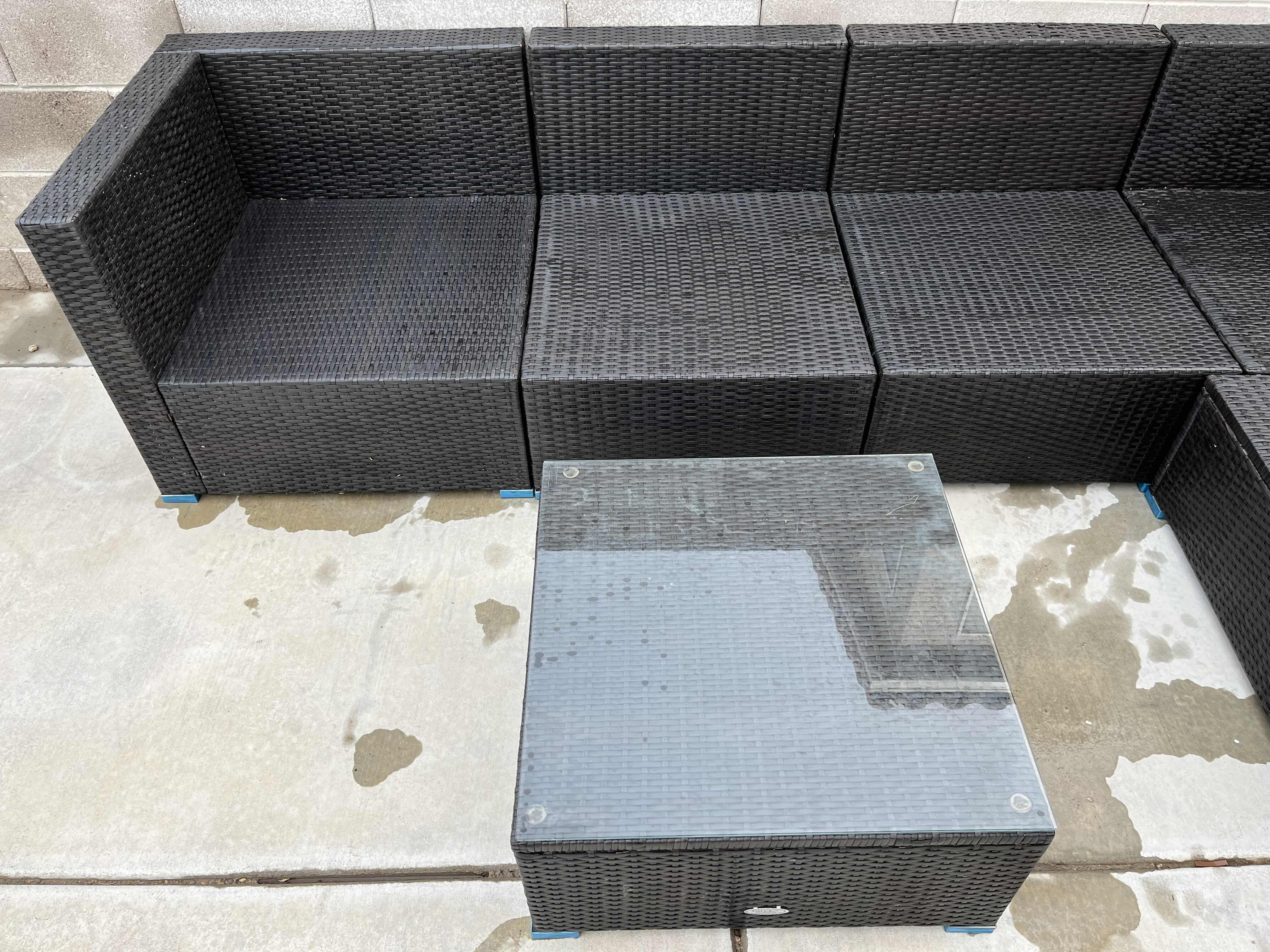 View 4 of PATIOJOY WOVEN AGED BRONZE FINISH PATIO 4PC SOFA 112” X 29.5” H25.5” W OTTOMAN & GLASS TOP TABLE