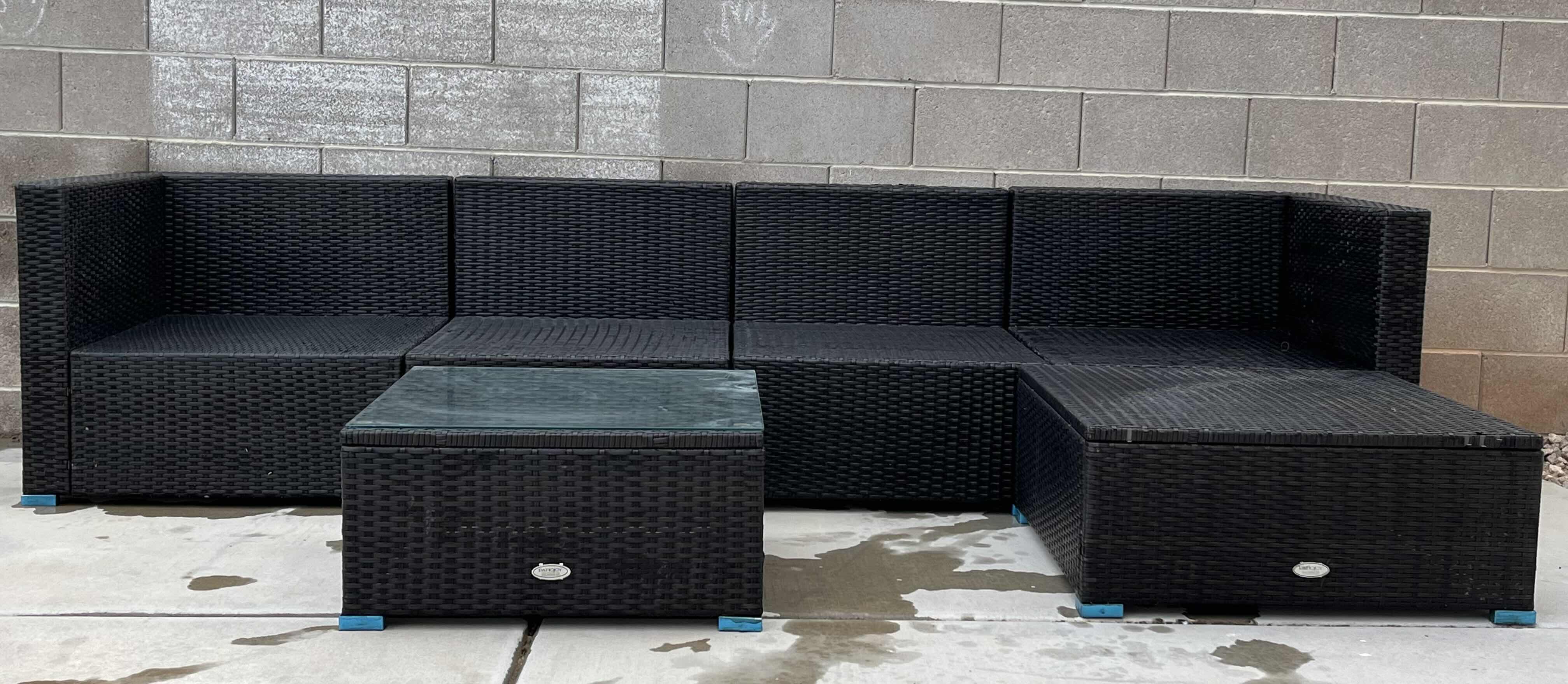 View 1 of PATIOJOY WOVEN AGED BRONZE FINISH PATIO 4PC SOFA 112” X 29.5” H25.5” W OTTOMAN & GLASS TOP TABLE