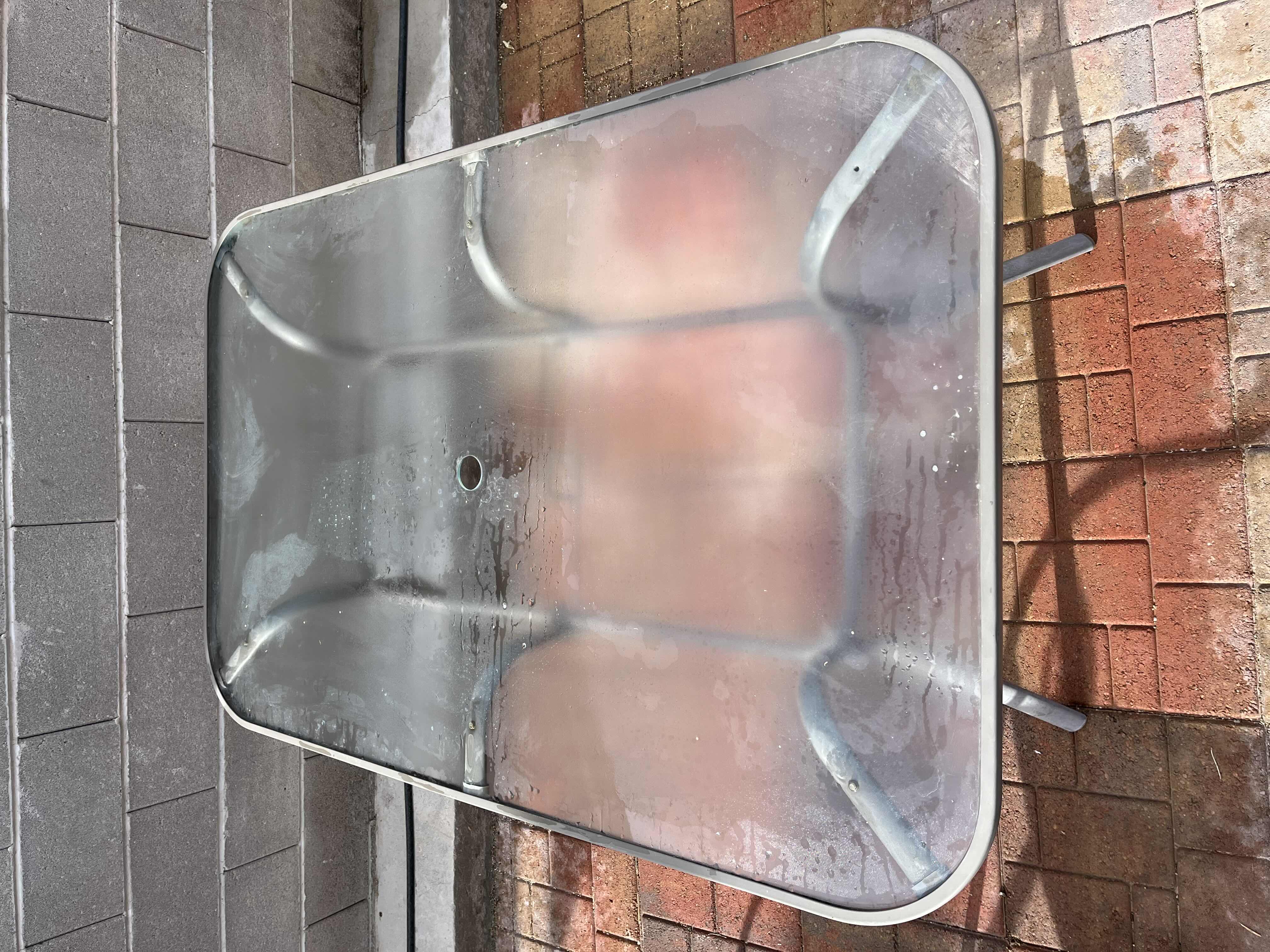 Photo 1 of PATIO GLASS TOP TABLE 60” X 38” H28.5” W MESH CHAIRS (6)