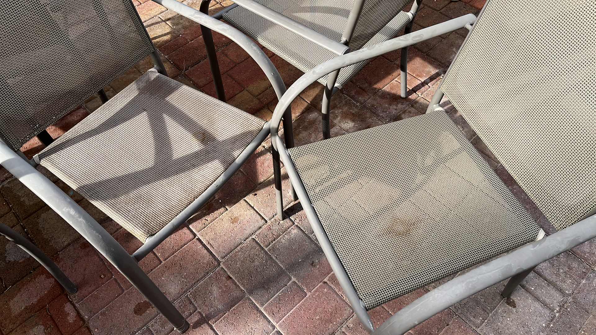 Photo 1 of PATIO GLASS TOP TABLE 60” X 38” H28.5” W MESH CHAIRS (6)