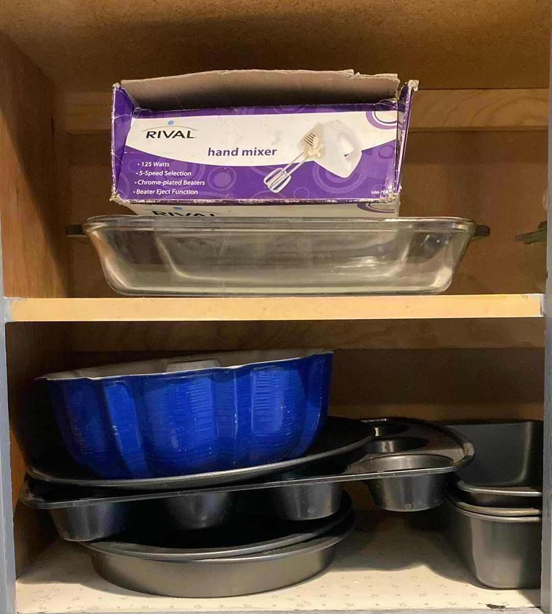 Photo 1 of CONTENTS OF CABINET- STEEL & GLASS BAKING PANS VARIOUS SIZES W ROLLING PIN & HAND MIXER