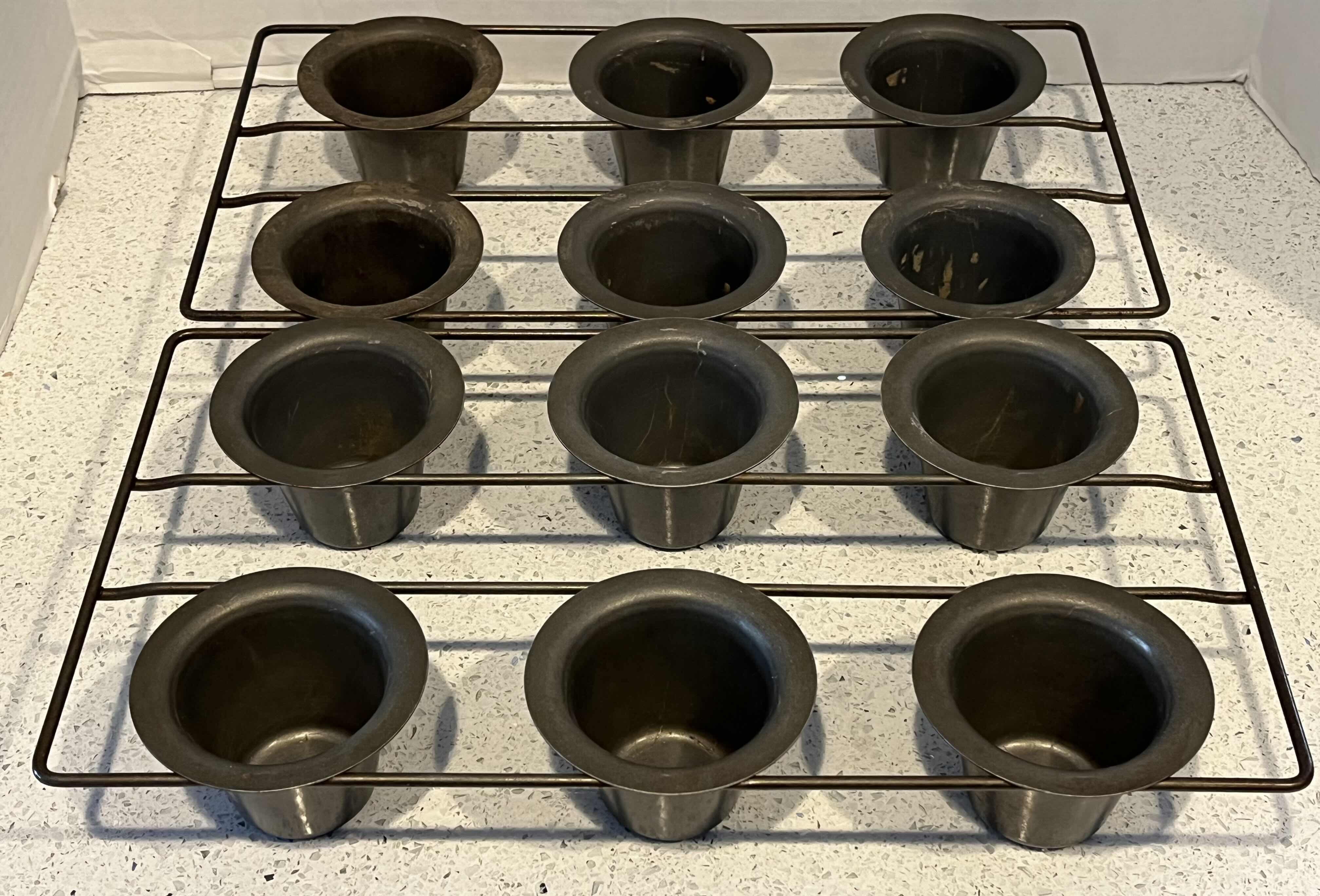 Photo 1 of CHICAGO METALLIC 6 NON-STICK POPOVER PANS W RACKS (2)
