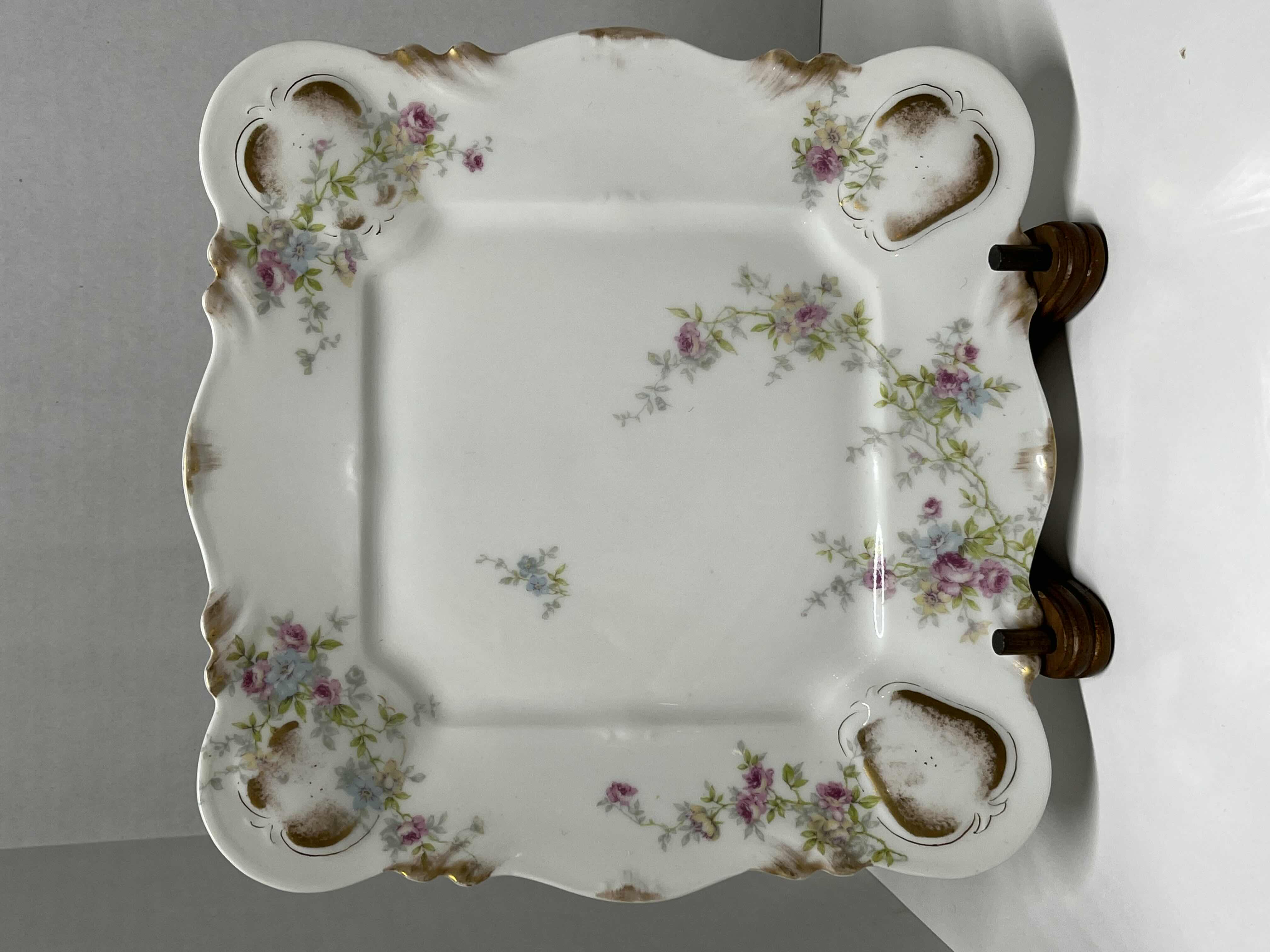 Photo 1 of ANTIQUE THEODORE HAVILAND LIMOGES FRANCE PINK, GREEN & GOLD EMBOSSED FLORAL DESIGN FINE CHINA PLATE SET (3) W WOOD DISPLAY STANDS (3)