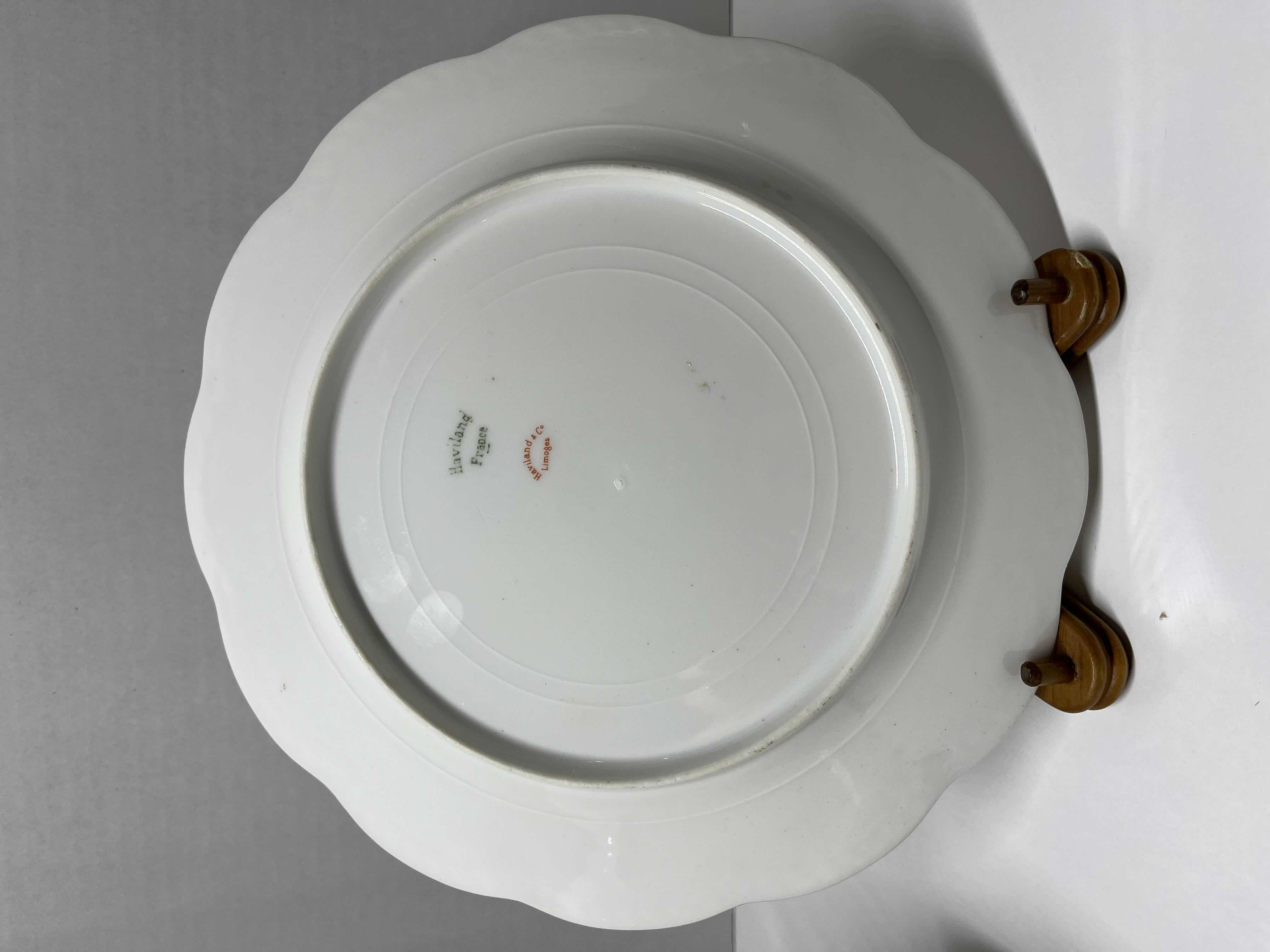 Photo 1 of ANTIQUE THEODORE HAVILAND LIMOGES FRANCE PINK, GREEN & GOLD EMBOSSED FLORAL DESIGN FINE CHINA PLATE SET (3) W WOOD DISPLAY STANDS (3)