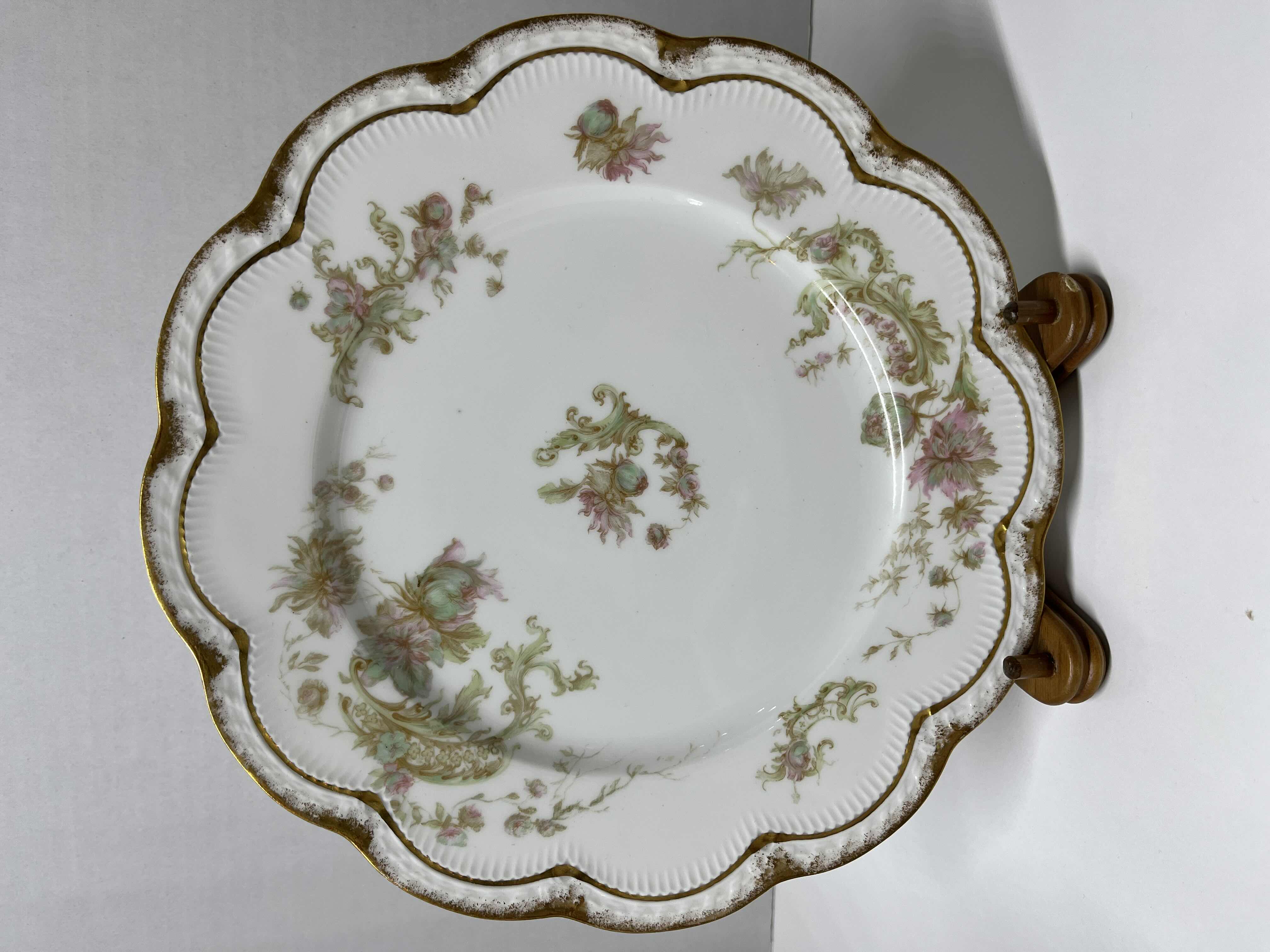 Photo 1 of ANTIQUE THEODORE HAVILAND LIMOGES FRANCE PINK, GREEN & GOLD EMBOSSED FLORAL DESIGN FINE CHINA PLATE SET (3) W WOOD DISPLAY STANDS (3)